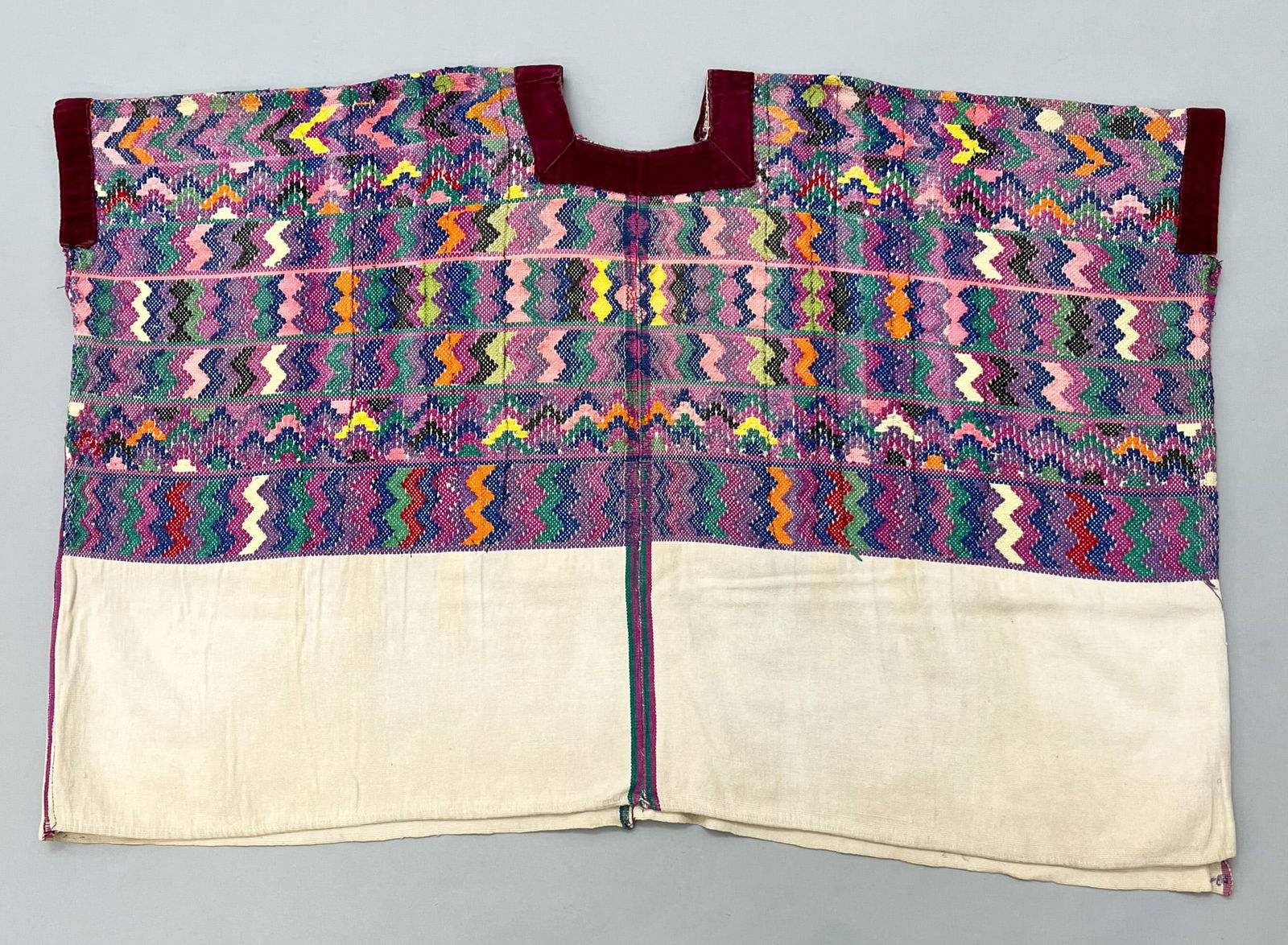 San Pedro Sacatepequez, Guatemala, Vintage Woven Cotton "Huipil" Tunic: San Pedro Sacatepequez, Guatemala, vintage undyed woven cotton "Huipil" tunic, embroidered with multicolor geometric pattern, 24"l x 36"w PROVENANCE:From the estate of Professor Philip Gould, New York
