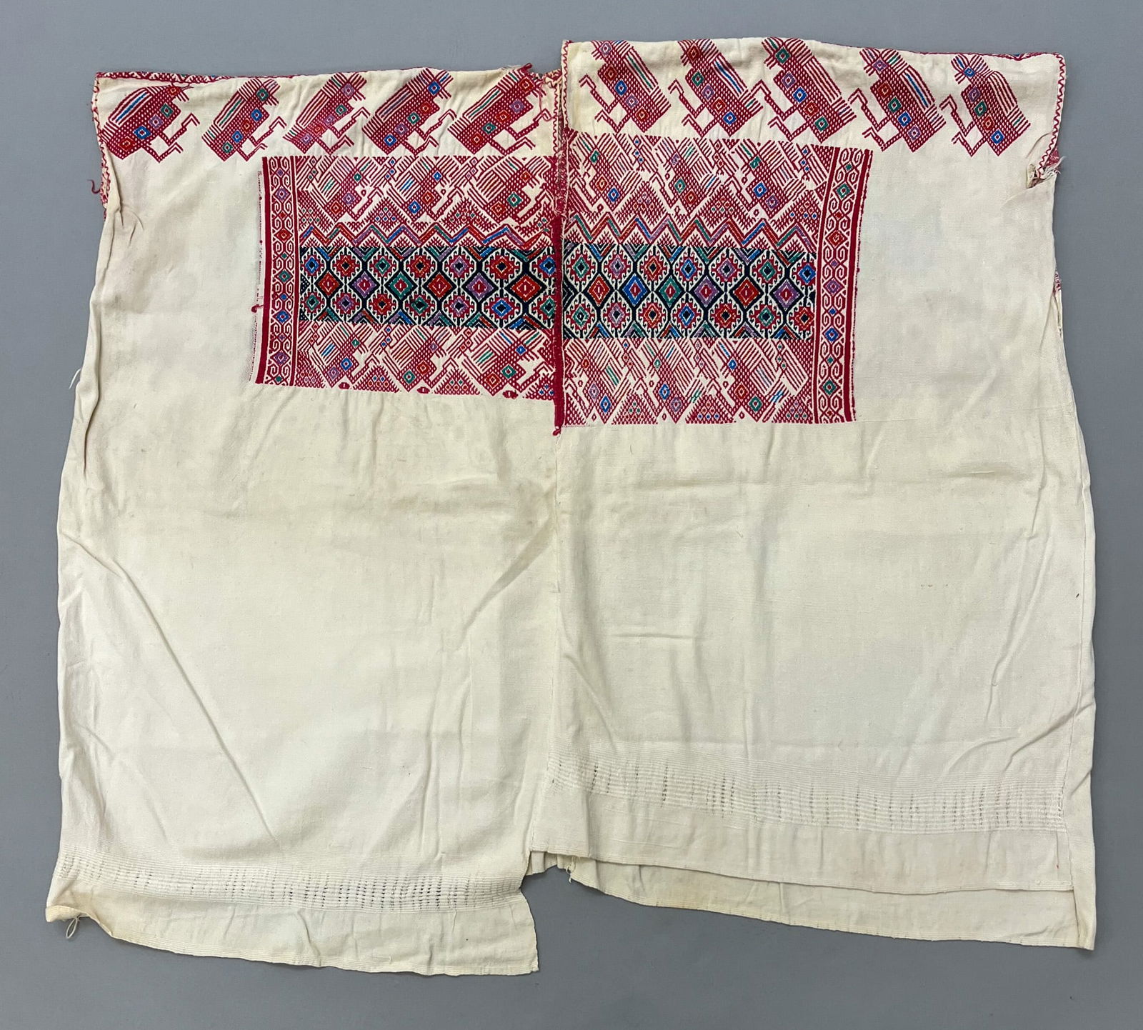 Nahuala, Solola, Guatemala, Vintage Woven Undyed Cotton "Huipil" Tunic Embroidery with Symbolic: Nahuala, Solola, Guatemala, vintage woven undyed cotton "Huipil" tunic embroidered with symbolic birds and rhombus motif, 29"l x 35"w PROVENANCE:From the estate of Professor Philip Gould, New York