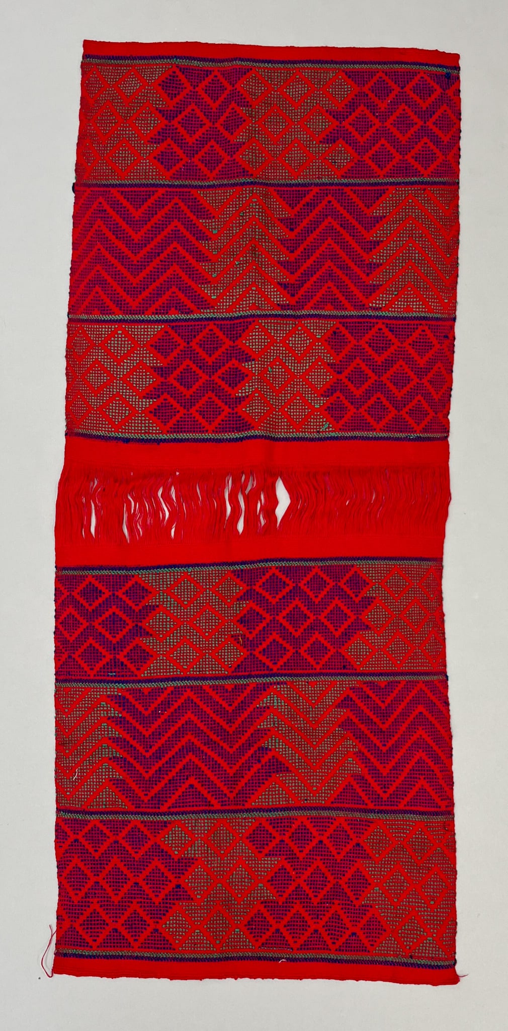 San Martin Sacatepequez, Quetzaltenango, Guatemala, Vintage Woven Cotton Textile: San Martin Sacatepequez, Quetzaltenango, Guatemala, vintage woven cotton textile, red ground with blue and green geometric pattern, 37"l x 15"w PROVENANCE:From the estate of Professor Philip Gould, Ne