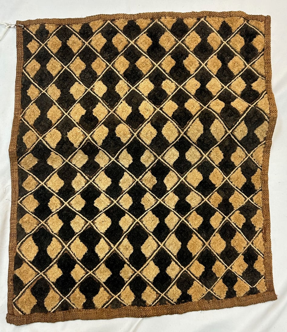Kuba Peoples Embroidered Raffia Textile: Kuba peoples, Democratic Republic of the Congo, Central Africa, cut-pile embroidered raffia textile, likely first half of the 20th century, 23" x 20" PROVENANCE: From the estate of Dr. Philip Gould, N