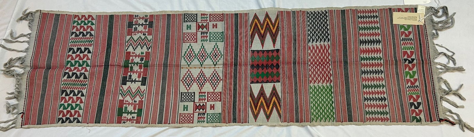 Nupe Peoples Woven Textile: Nupe peoples, Nigeria, West Africa, cotton, vertical loom woven, with supplementary weft, geometric patterning, mid-20th century, 84" x 26" PROVENANCE: From the estate of Dr. Philip Gould, New York