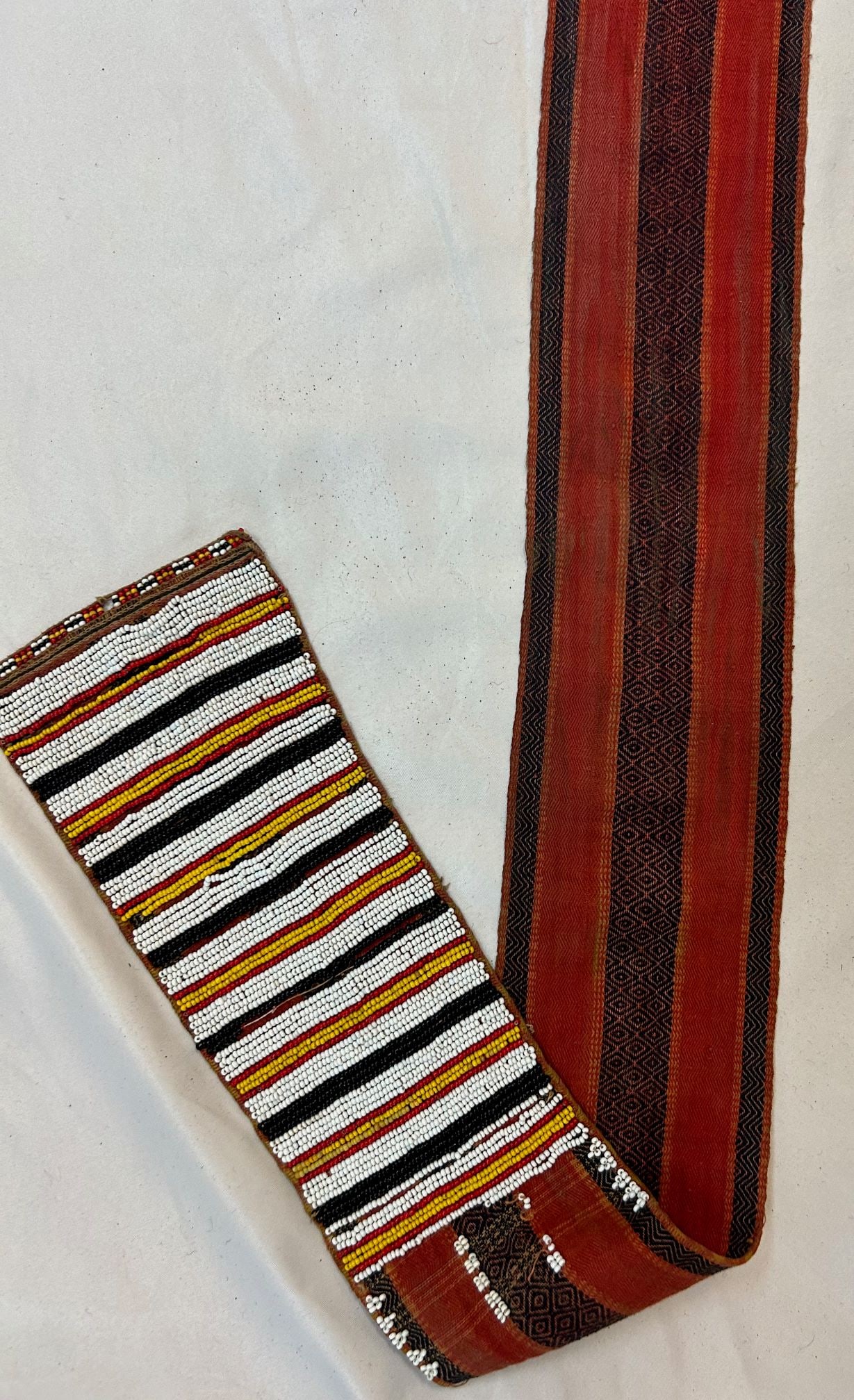 Handmade Beaded Belt: Handmade beaded belt, Approximate size, 100" x 4". PROVENANCE: From the estate of Dr. Philip Gould, New York