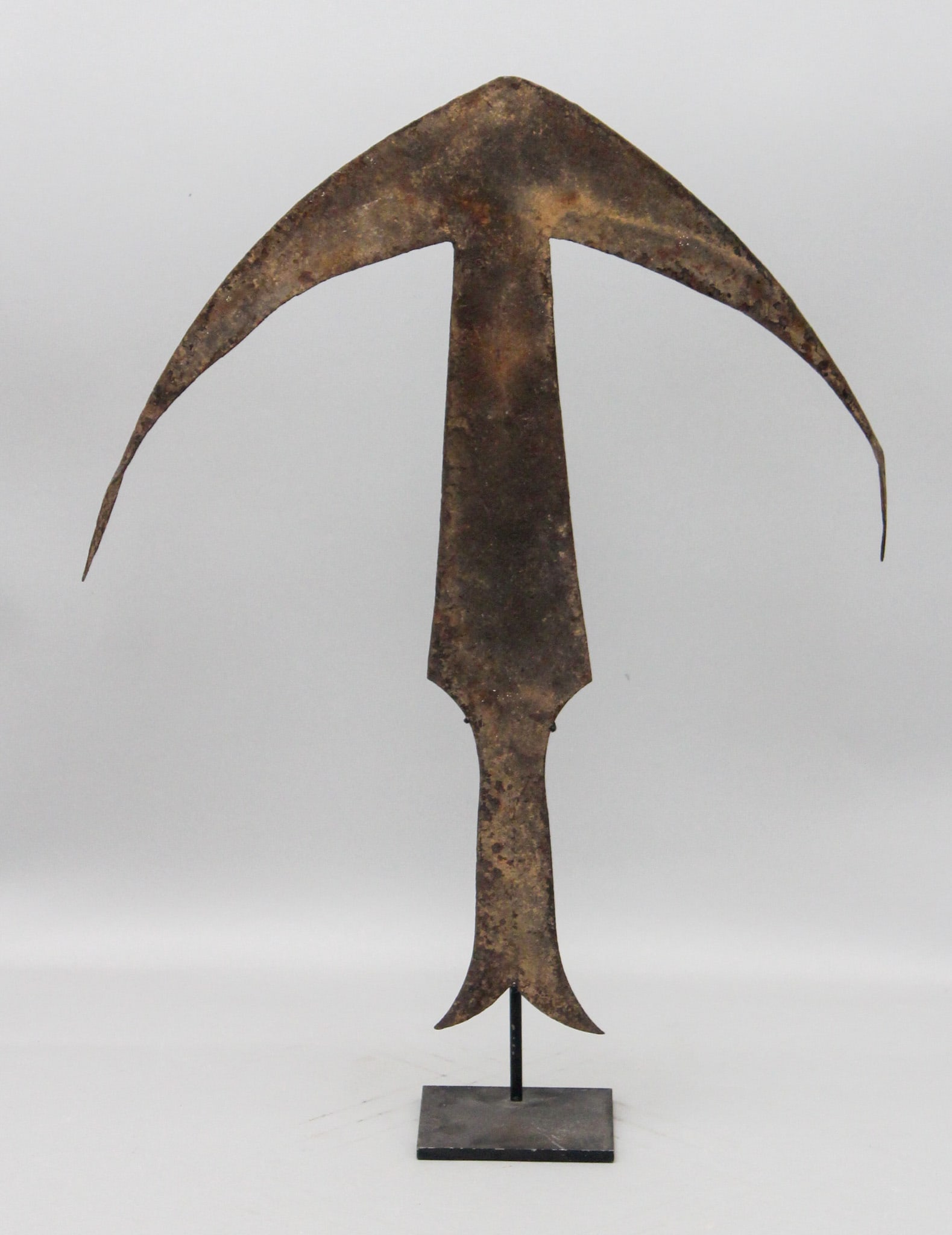 Anchor Currency, Kwele peoples, Democratic Republic of the Congo, Central Africa: 19th Century or early 20th century anchor currency, Kwele peoples, Democratic Republic of the Congo, Central Africa, good aged patina, with custom stand. Approximate size, 19.5”H (21.75”H on stand