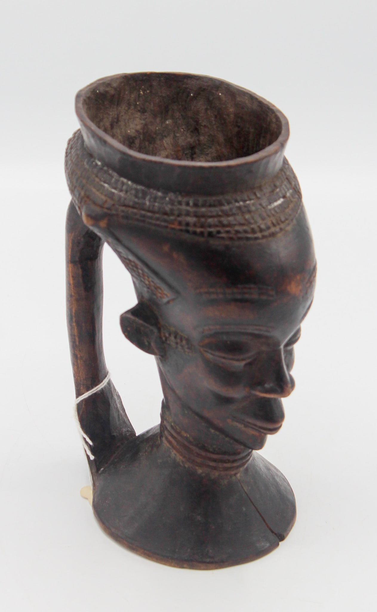 Kuba people, carved wood palm wine cup, Democratic Republic of the Congo, Central Africa: Kuba peoples, carved wood palm wine cup, Democratic Republic of the Congo, Central Africa, mid-20th century. Approximate size 7.25"H x 4"W. PROVENANCE: From the estate of Dr. Philip Gould, New York