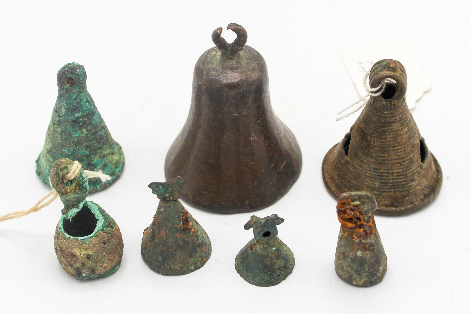 Group of (7) West African Bells, Various Cultures, Bronze, First Half of the 20th century and (1 of 8)