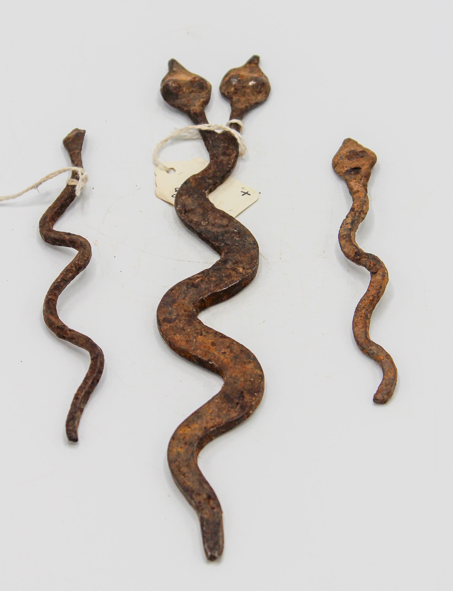 Group of (3) Wrought Iron Currency Snakes (one two-headed), Lobi peoples (1 of 4)