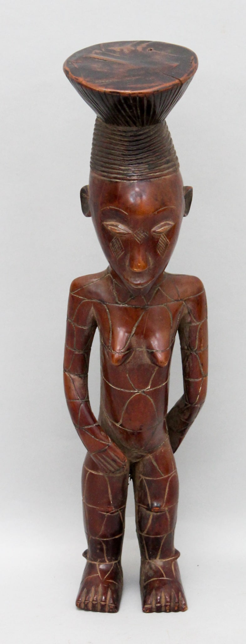 Mangbetu Style, Carved Wood Figure, Democratic Republic of the Congo, Central Africa: Mangbetu style, carved wood figure, Democratic Republic of the Congo, Central Africa, 20th century. Approximate size, 17" H. PROVENANCE: From the estate of Dr. Philip Gould, New York