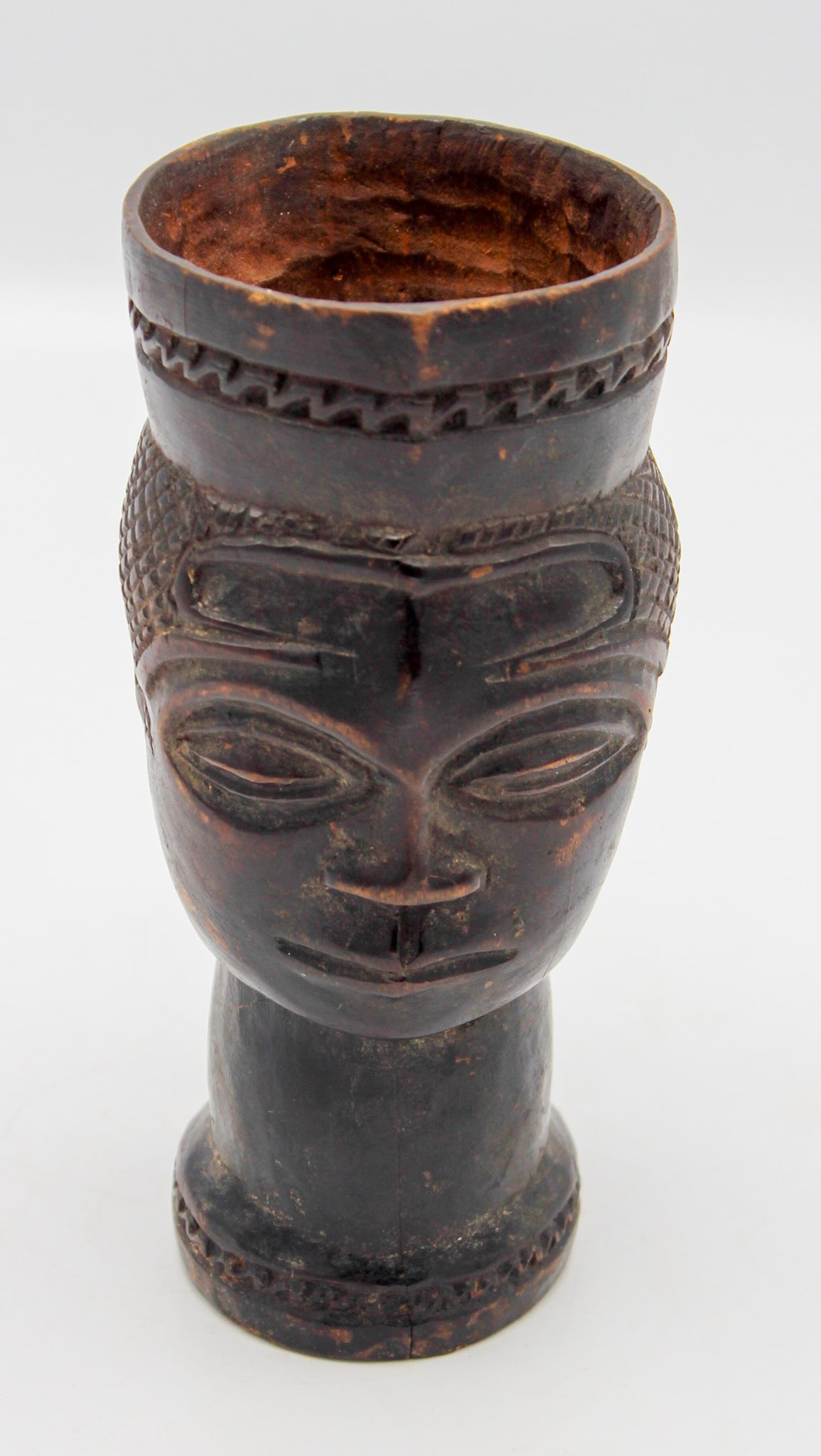 Kuba peoples Carved Wood Palm Wine Cup, Democratic Republic of the Congo, Central Africa: Kuba peoples, carved wood palm wine cup, Democratic Republic of the Congo, Central Africa, 20th century. Approximate size 6.25"H. PROVENANCE: From the estate of Dr. Philip Gould, New York