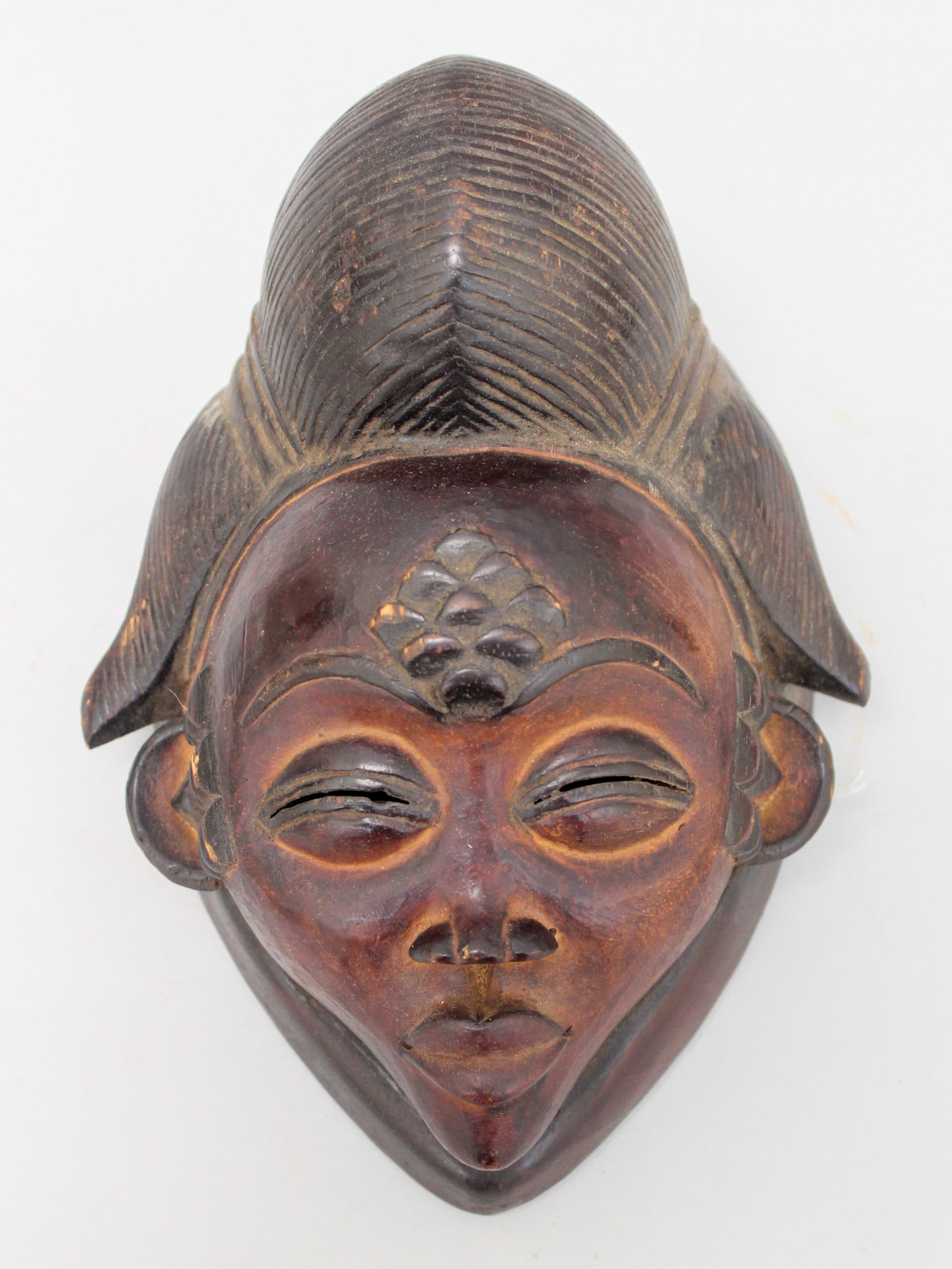 Punu People Style, Carved Wood Mask, Gabonese Republic, Central Africa: Punu people style, carved wood mask, Gabonese Republic, Central Africa, 20th century. Approximate size, 10.9"H. PROVENANCE: From the estate of Dr. Philip Gould, New York