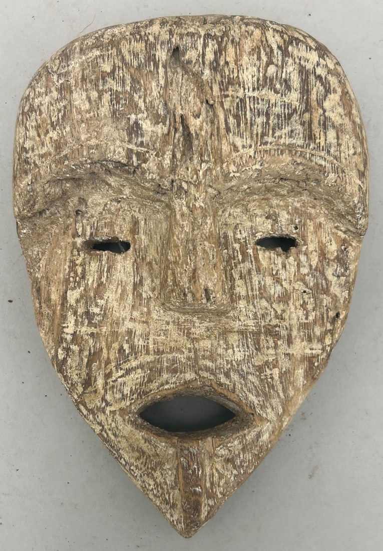 Vuvi Peoples Style, Carved Wood Mask, Gabonese Republic, Central Africa: Vuvi peoples style carved wood mask, Gabonese Republic, Central Africa, 20th century. Approximate size, 8.1"H. PROVENANCE: From the estate of Dr. Philip Gould, New York