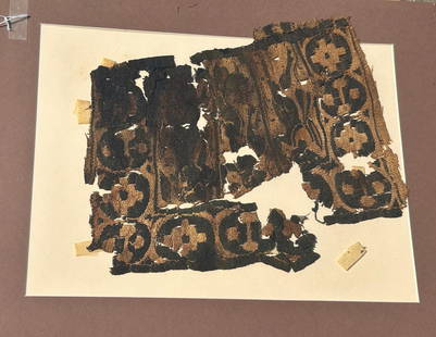 3rd - 10th Century Coptic Textile Fragment, Egypt, North Africa: 3rd - 10th Century Coptic textile fragment, with figure and geometric cross patterned border, Egypt, North Africa. Approximate size 13"H x 10"W, with a mat with outside dimensions 20"H x 16"W. 