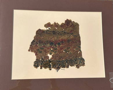 3rd - 10th Century Coptic Textile Fragment, Egypt, North Africa: 3rd - 10th Century Coptic textile fragment, highly decorative patterning, Egypt, North Africa. Approximate size 9.5"H x 9"W, with a mat with outside dimensions 20"H x 16"W. PROVENANCE: From the