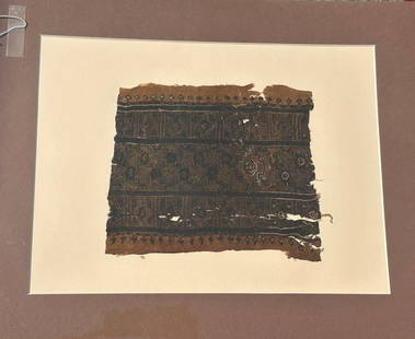 3rd - 10th Century Coptic Textile Fragment, Egypt, North Africa: 3rd - 10th Century Coptic textile fragment, complex geometric pattern with eight-pointed star and decorative border, Egypt, North Africa. Approximate size 9.5"H x 8"W, with a mat with outside dimens