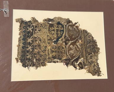 3rd - 10th Century Coptic Textile Fragment, Egypt, North Africa: 3rd - 10th Century Coptic textile fragment, highly complex patterning including central double-cross motif, Egypt, North Africa. Approximate size 14"H x 8"W, with a mat with outside dimensions 20"H x