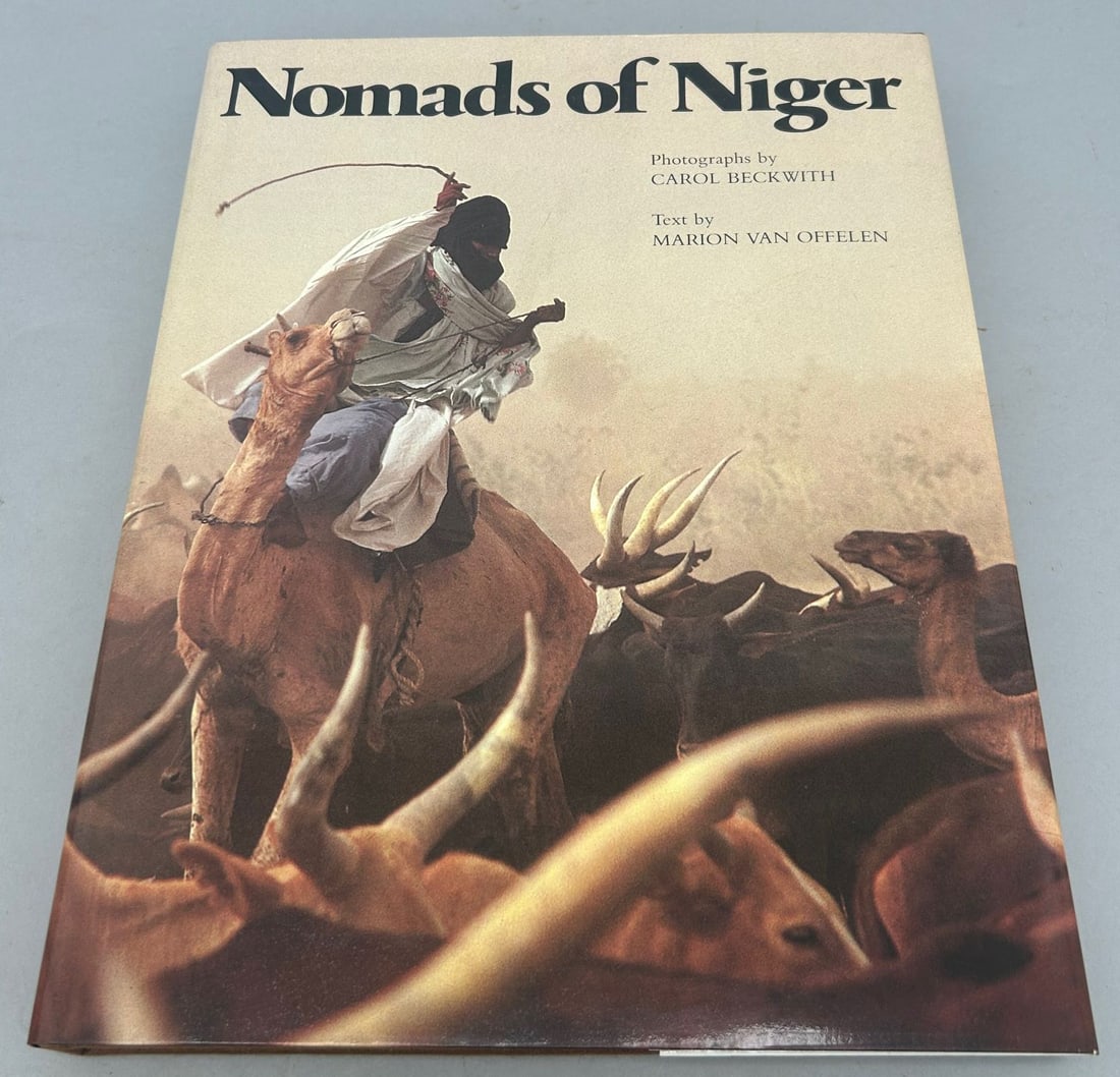Nomads of Niger with Photographs by Carol Beckwith and text by Marion Van Offelen: Nomads of Niger with photographs by Carol Beckwith and text by Marion Van Offelen, hardback, signed by both Carol Beckwith and Marion Van Offelen. Approximate dimensions 13.25"H x 10.5"W, 224 pages. P