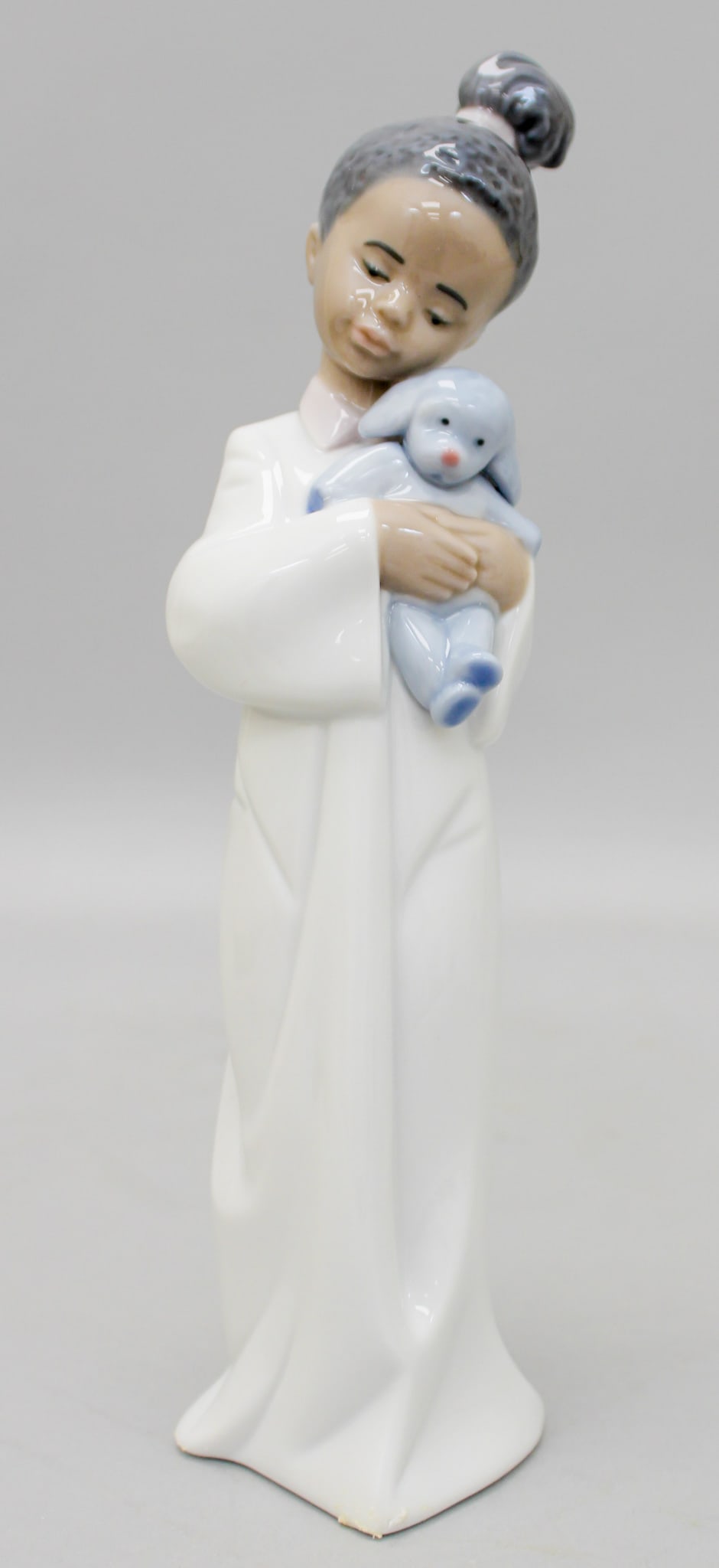 Lladro "My Cuddly Puppy" 6463 Black Legacy Figurine: Lladro "My Cuddly Puppy" 6463 Black Legacy figurine, mark on bottom Lladro, Hand Made in Spain, Daisa 1997, 6463 C-20 E, 9.75"h x 2.5"w x 3" d, in original box 6"h x 12"w x 6.5"d