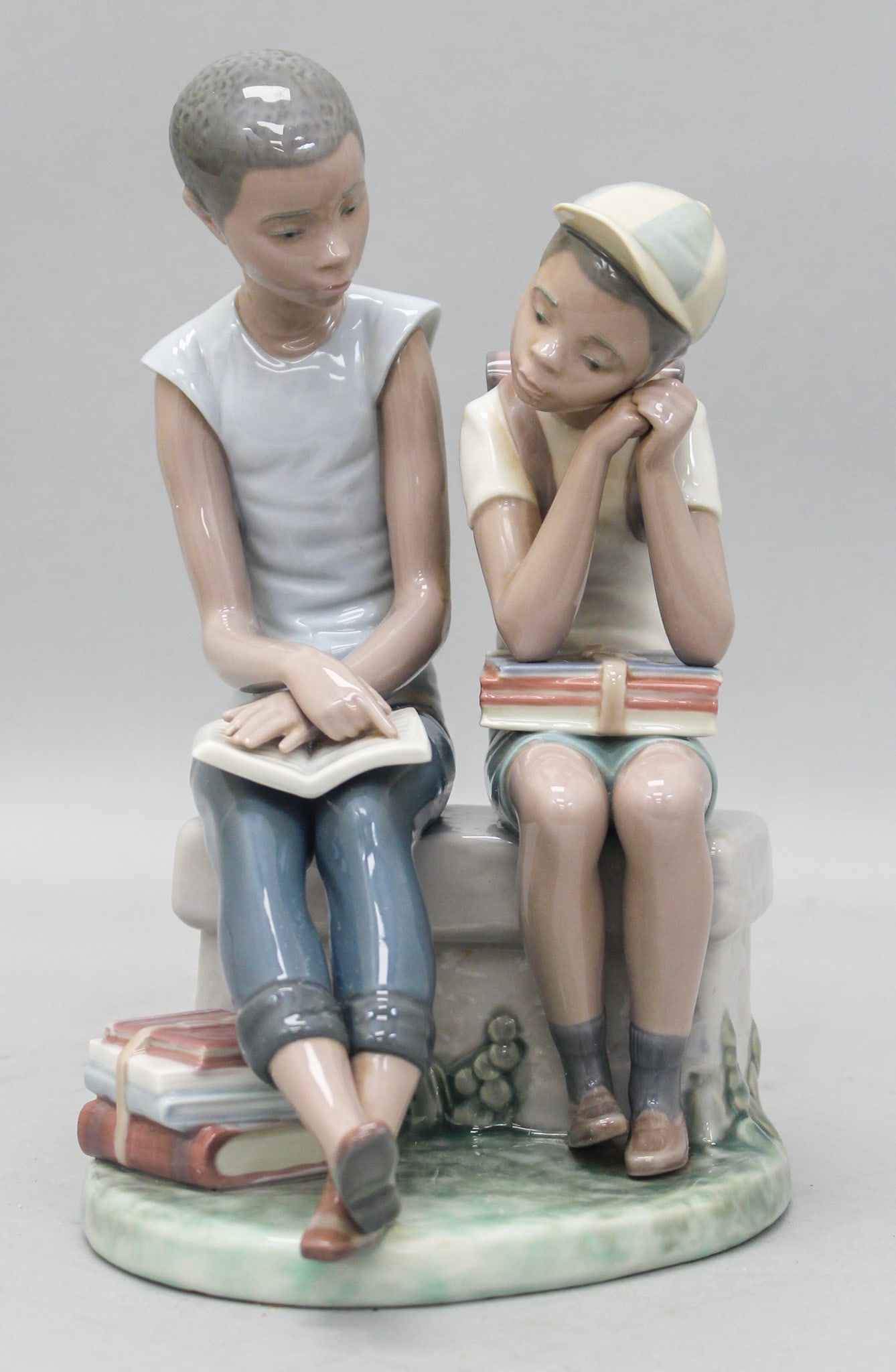 Lladro "School Chums" 5237 Black Legacy Figurine: Lladro "School Chums" 5237 Black Legacy figurine, mark on bottom Lladro, Hand Made in Spain, Daisa 1984, H9E, 9"h x 5.25"w x 7"d in original box
