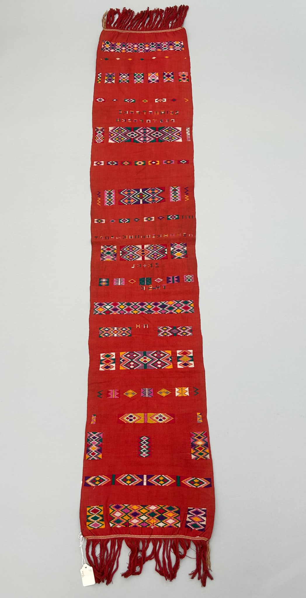 Timor, Indonesia, Vintage Cotton Textile with Traditional Pattern: Timor, Indonesia, vintage cayenne color cotton textile with traditional pattern, 56" x 11"w