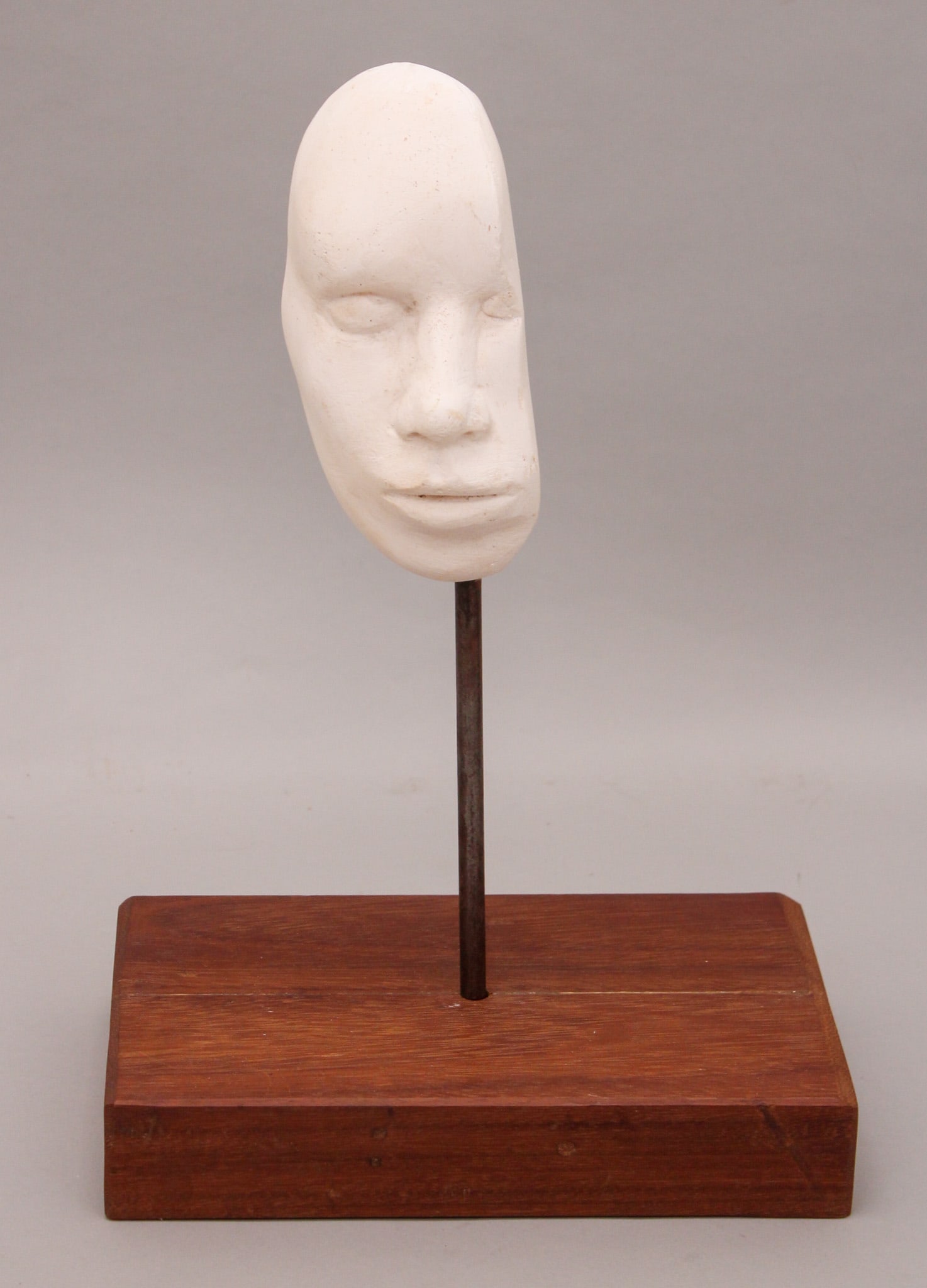 Plaster Face Fragment Sculpture on Plinth (1 of 5)