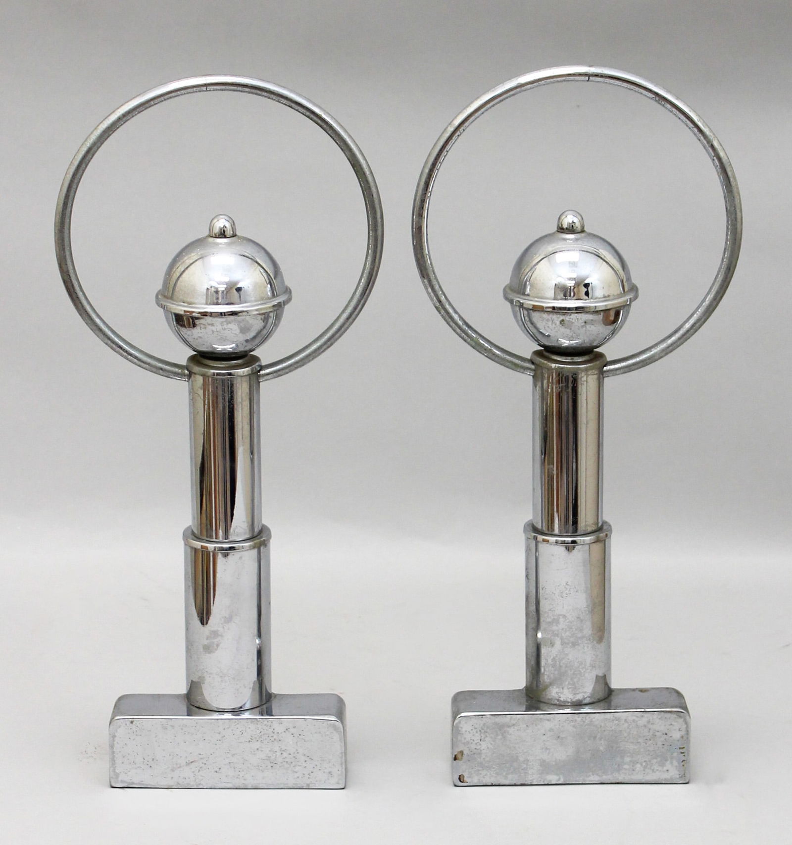 Pair of Art Deco Style Chrome Andiron Fronts: Pair of Art Deco style chrome andiron fronts, marked 520, 16"h x 5.5"w x 1.5"d