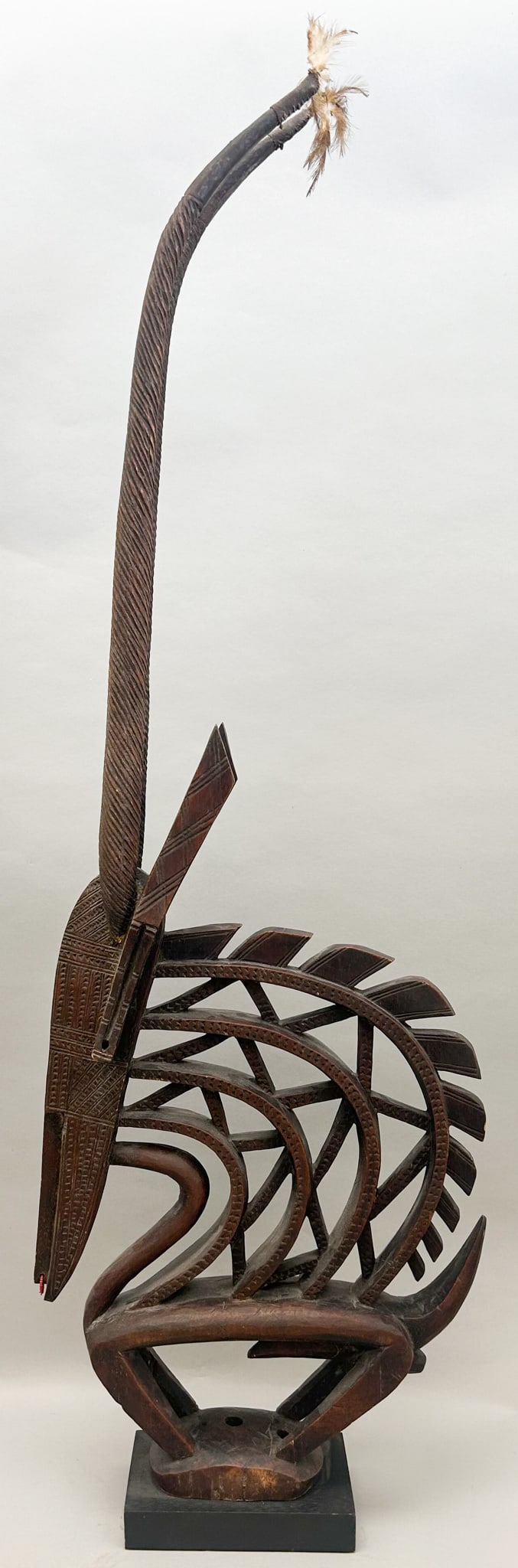 Bambara Peoples, Chi wara Antelope Headdress: Chi wara, a mytical cultural hero, wooden headdress in the form of antelopes, 58"h x 4.25"w x 14"d