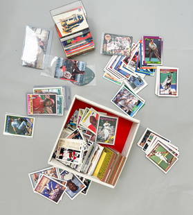 Vintage Basketball and Baseball Cards,Hockey, Marvels cards, Batman, Starwars,: Nice mix of Batman, Starwars, Marvels, Spiderman, Jurassic Park, Jumanji, football cards with Manning, Rice and Marino, basketball cards with Magic Johnson and Jordan, baseball cards with Nolan Ryan a