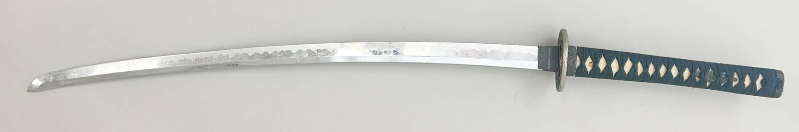 Reproduction of Vintage Japanese Samurai Sword: Reproduction of Vintage Japanese samurai sword with ornate white metal hilt, no scabbard sword size 39"l