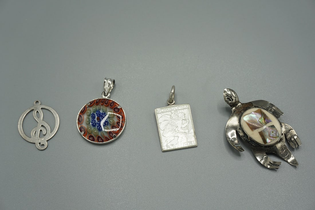 Lot of 4 - Sterling Silver Pendants & Brooch: Lot of 4 - Sterling silver pendants 1- Multi color resin pendant 2- St. Christopher Pendant 3- Music key pendant 4- Turtle brooch, wgt:14 gr, All weights are approximate