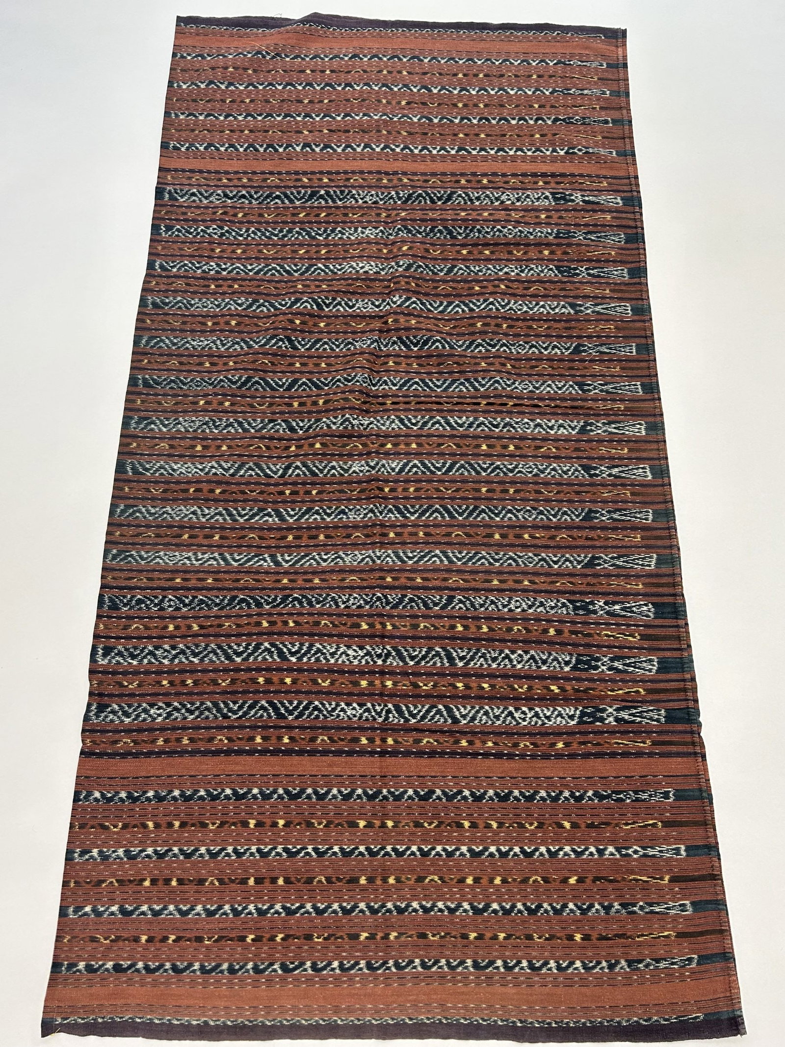 Indonesia, Flores,Ende Regency, Woven Cotton Ethnic Tubular Sarong: Indonesia, Flores, Ende Regency, Woven Cotton Ethnic Sarong , 61"l X 27"w Provenance: From the estate of Dr. Philip Gould , New York