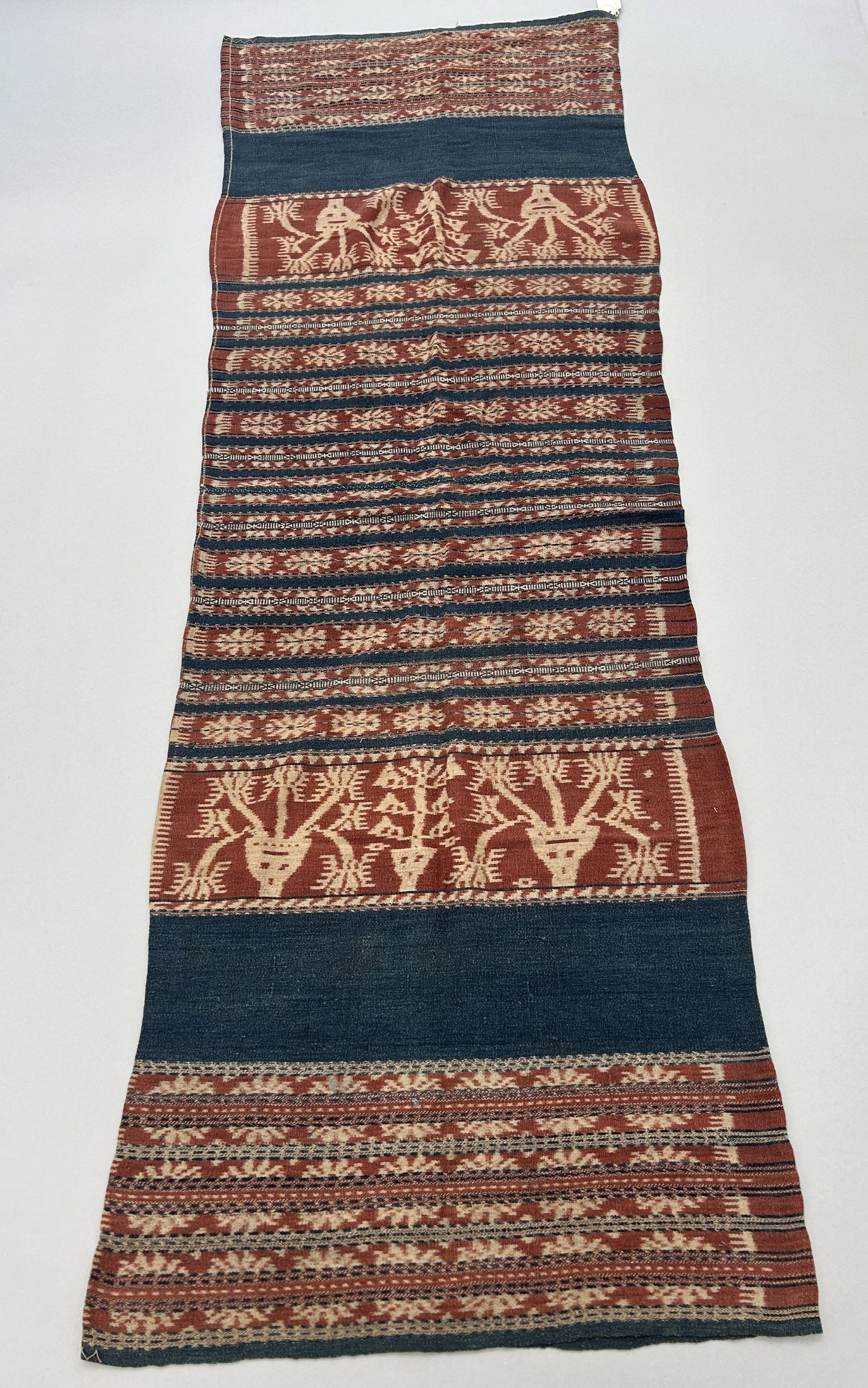 Indonesia, Sumba, Ikat, Woven Cotton Ethnic Tubular Sarong: Indonesia, Sumba, Ikat, Woven Cotton Ethnic Tubular Sarongz, 23"l X 13"w Provenance: From the estate of Dr. Philip Gould , New York