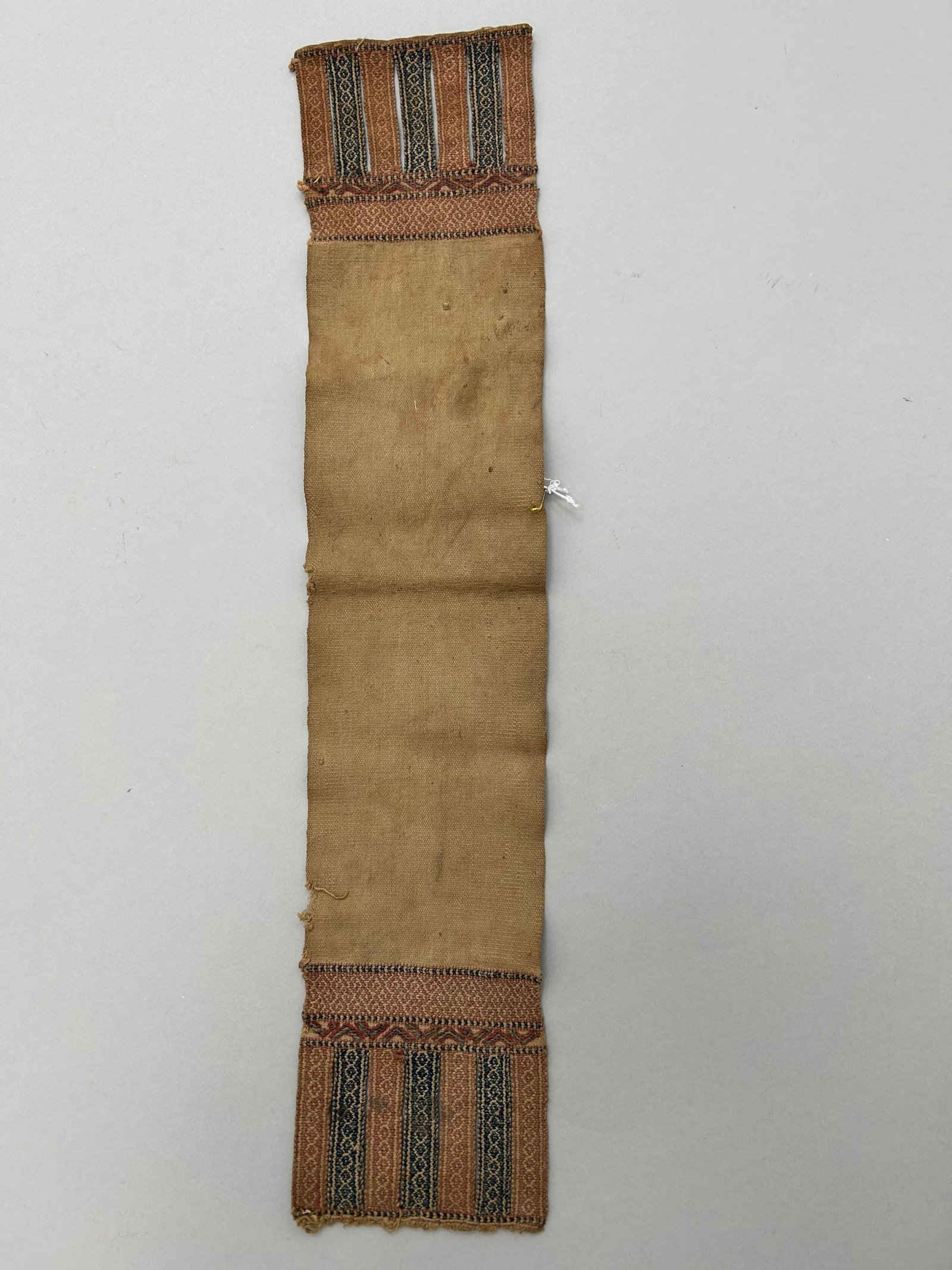 Indonesia, Timor Ikat Headband: Indonesia, Timor Ikat Embroidered Cotton Headband, 18"l X 3.5"w Provenance: From the estate of Dr. Philip Gould , New York