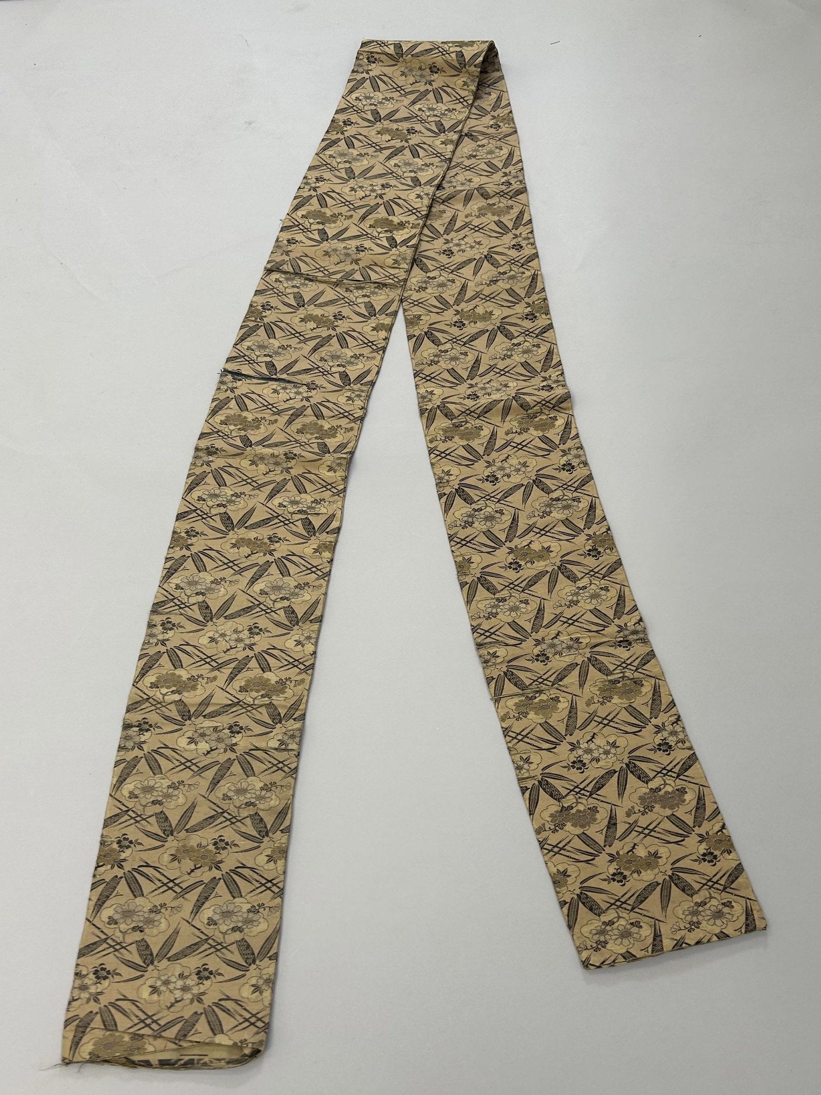 Japanese Silk Obi with Bamboo Pattern: Japanese Silk Obi with Bamboo Pattern, 109"h x 6"w Provenance: From the estate of Dr. Philip Gould , New York