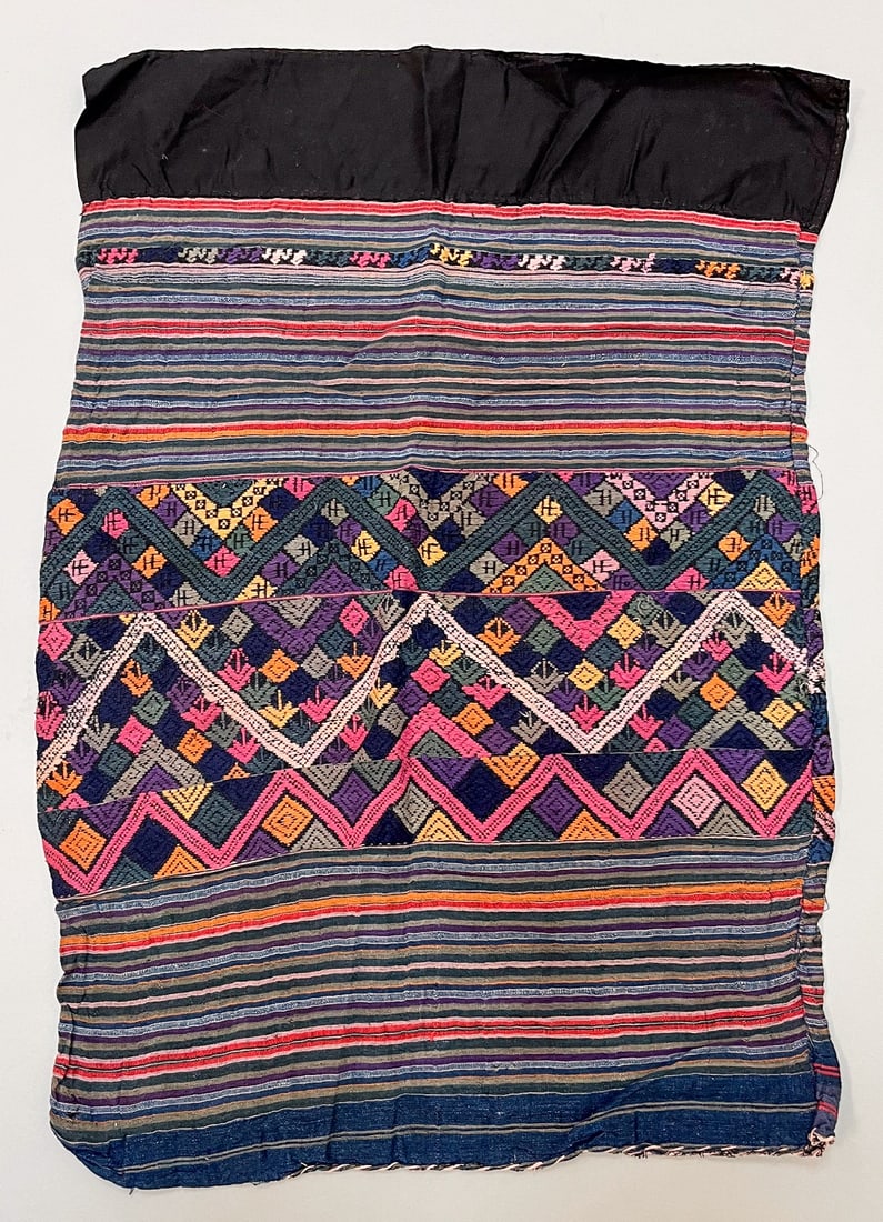 Possibly Tai Daeng People, Laos, Vintage Woven Cotton "Sinh" Tubular Sarong: Possibly Tai Daeng People, Laos, vintage woven cotton "Sinh" tubular sarong with assorted color stripes and traditional embroidery pattern, 32"l x 22"w Provenance: From the estate of Dr. Philip Gould 