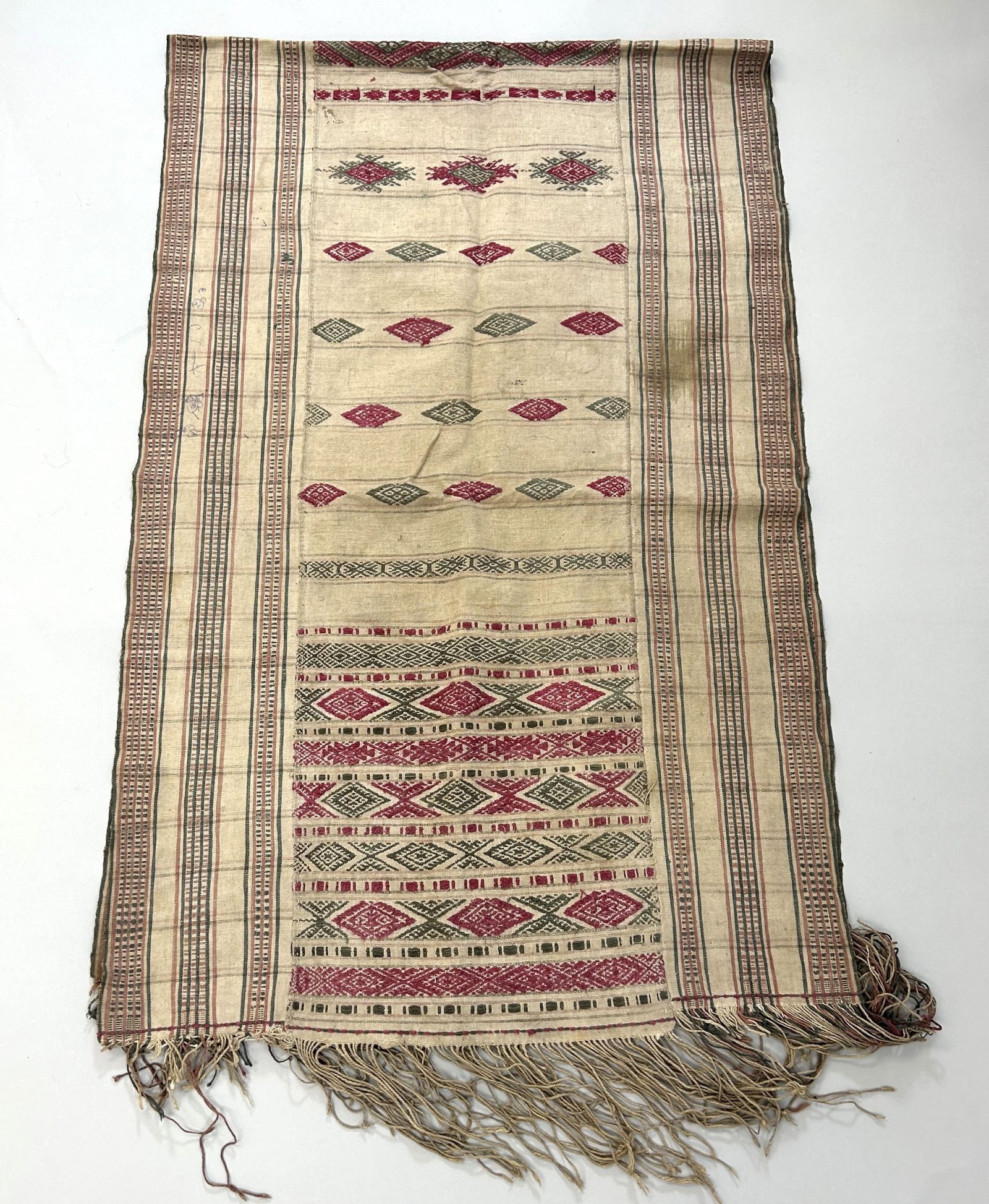 Bhutan Handwoven Embroidered Cotton Textile: Bhutan Handwoven Embroidered Cotton Textile, 78"l x 26"w (90''l with fringes) Provenance: From the estate of Dr. Philip Gould , New York