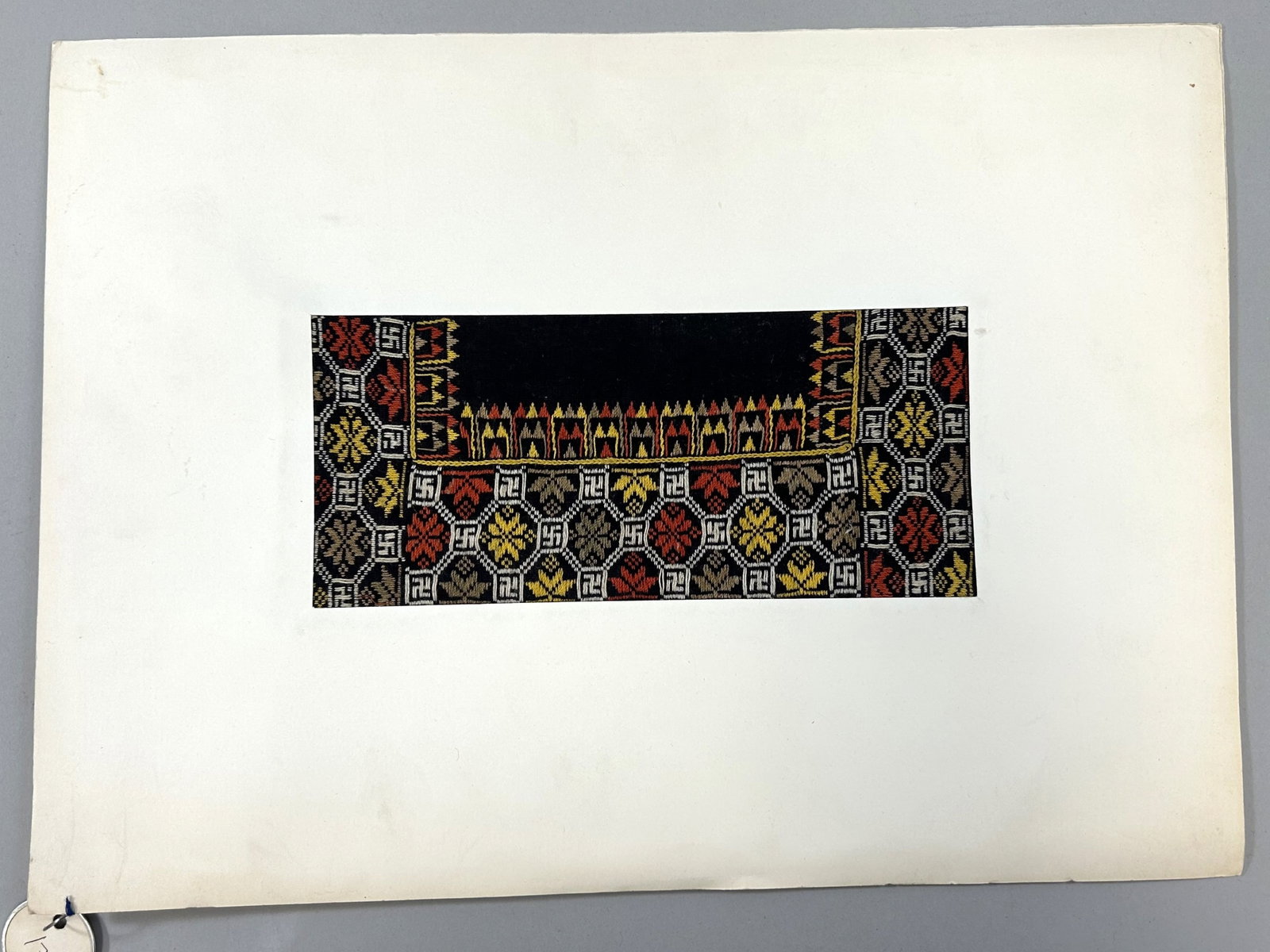 Taiwan Aboriginal Embroidered Matted Textile Fragment: Taiwan Aboriginal Embroidered Textile Fragment, possibly matted for exhibited, approximately 9"l x 4"w Provenance: From the estate of Dr. Philip Gould , New York