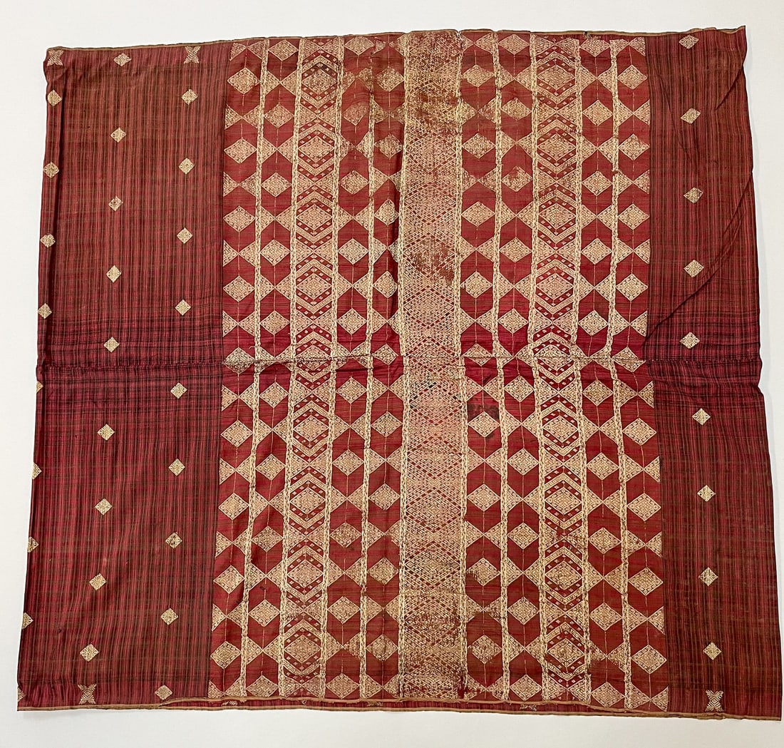 Terengganu, Malaysia, Vintage Silk "Longyi" Tubular Sarong: Terengganu, Malaysia, vintage silk "Longyi" tubular sarong, burgundy with check and geometric gold-tone metallic embroidery pattern, 36"l x 38"w Provenance: From the estate of Dr. Philip Gould , New Y
