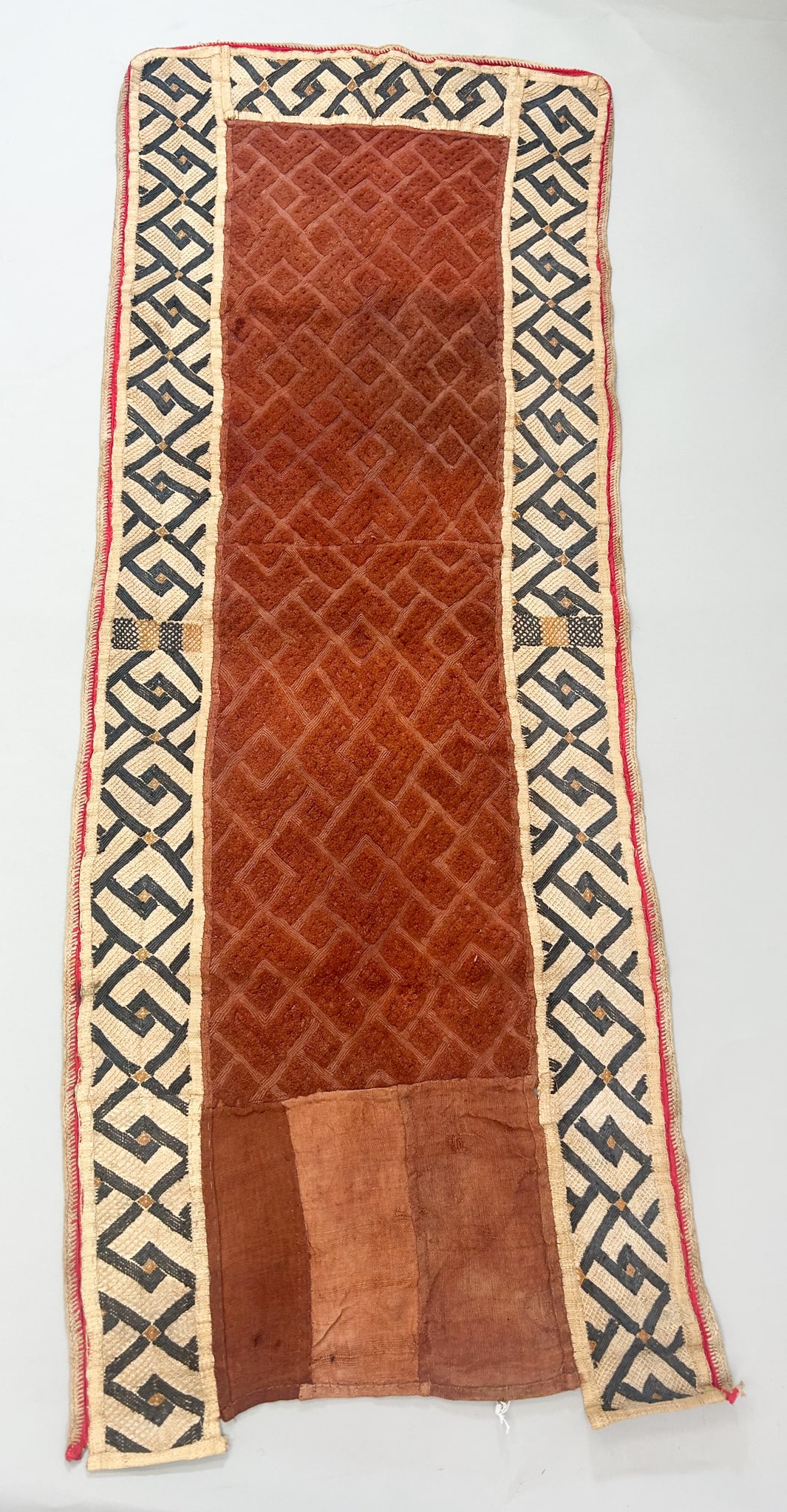 Kuba Women's Overskirt: Kuba peoples, Bushoong, Shoowa, women's raffia overskirt, mid-20th century, Democratic Republic of the Congo, Central Africa, 63" x 24" PROVENANCE:From the estate of Professor Philip Gould, New York