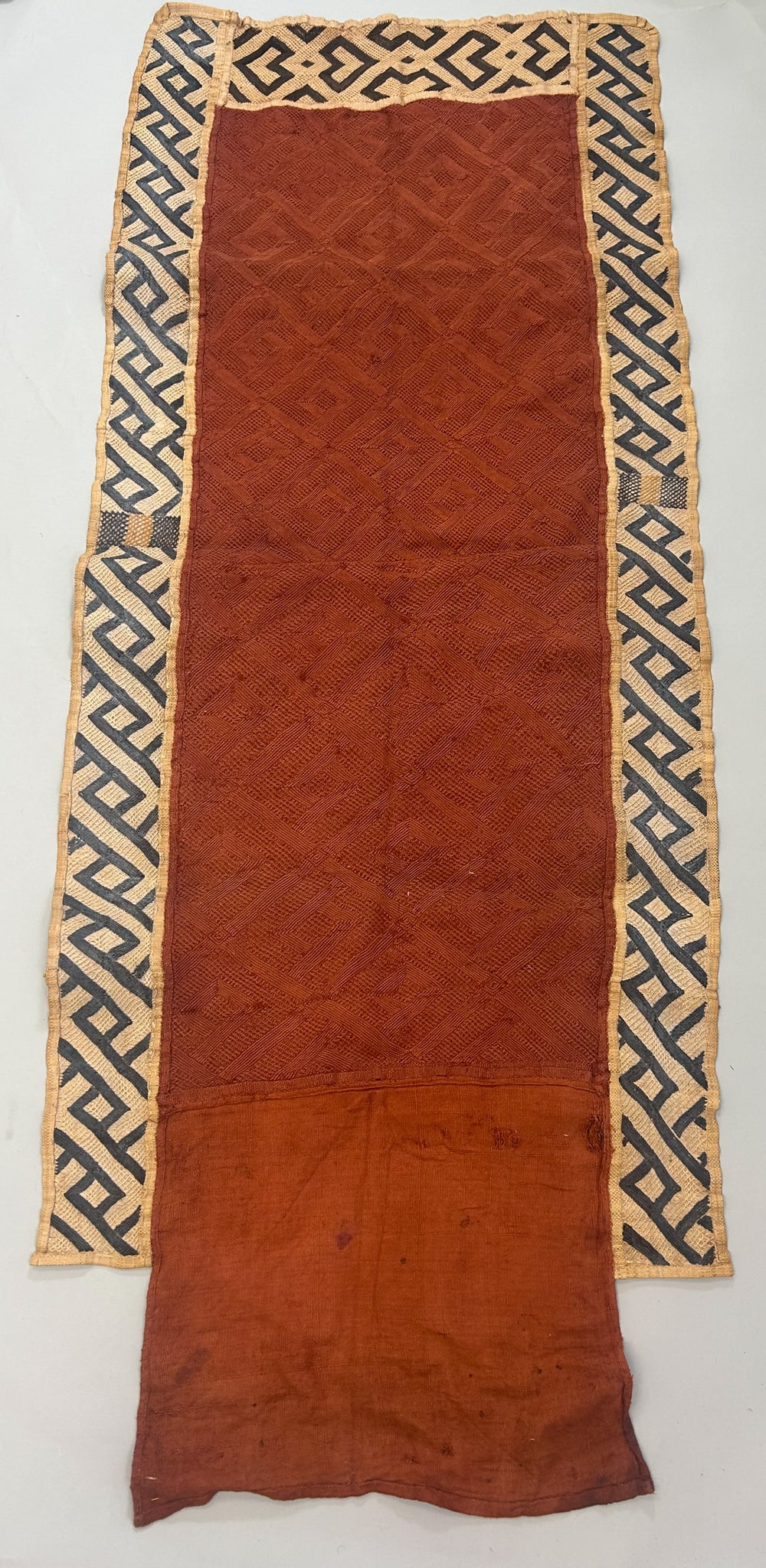 Kuba Women's Overskirt: Kuba peoples, Bushoong, Shoowa women's raffia overskirt, mid-20th century, Democratic Republic of the Congo, Central Africa, 65" x 26" PROVENANCE:From the estate of Professor Philip Gould, New York