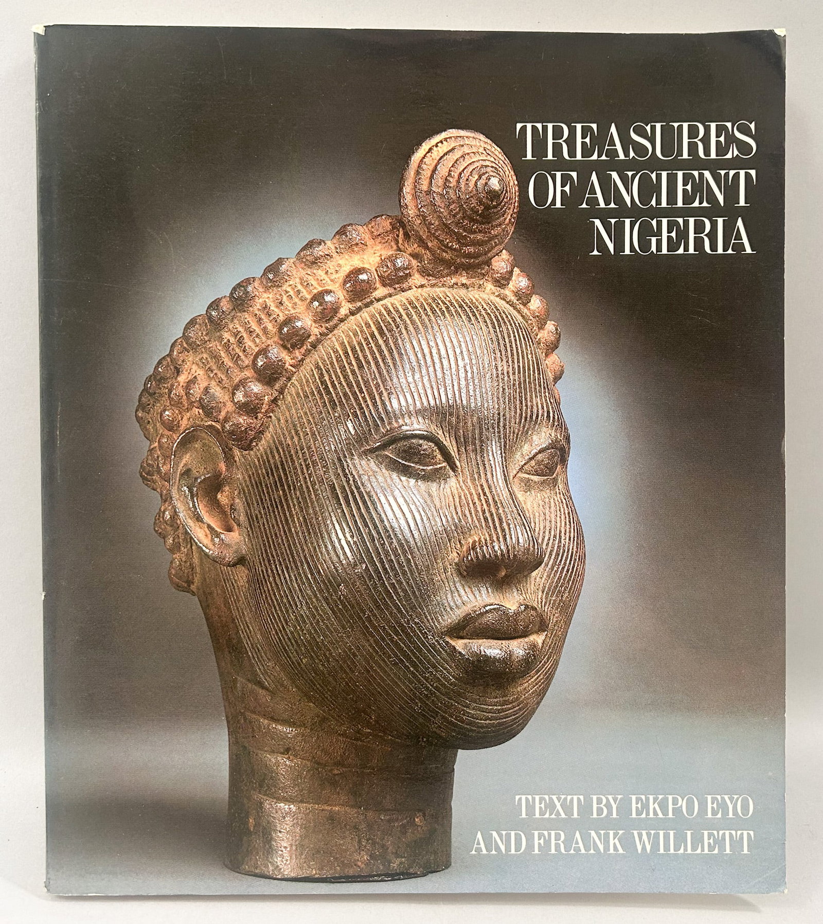 Treasures of Ancient Nigeria, Text by Expo Eyo and Frank Willet,: Treasures of Ancient Nigeria, Text by Expo Eyo and Frank Willet, hardback. Approximate dimensions 10.5"H x 9"W, 160 pages. PROVENANCE:From the estate of Professor Philip Gould, New York