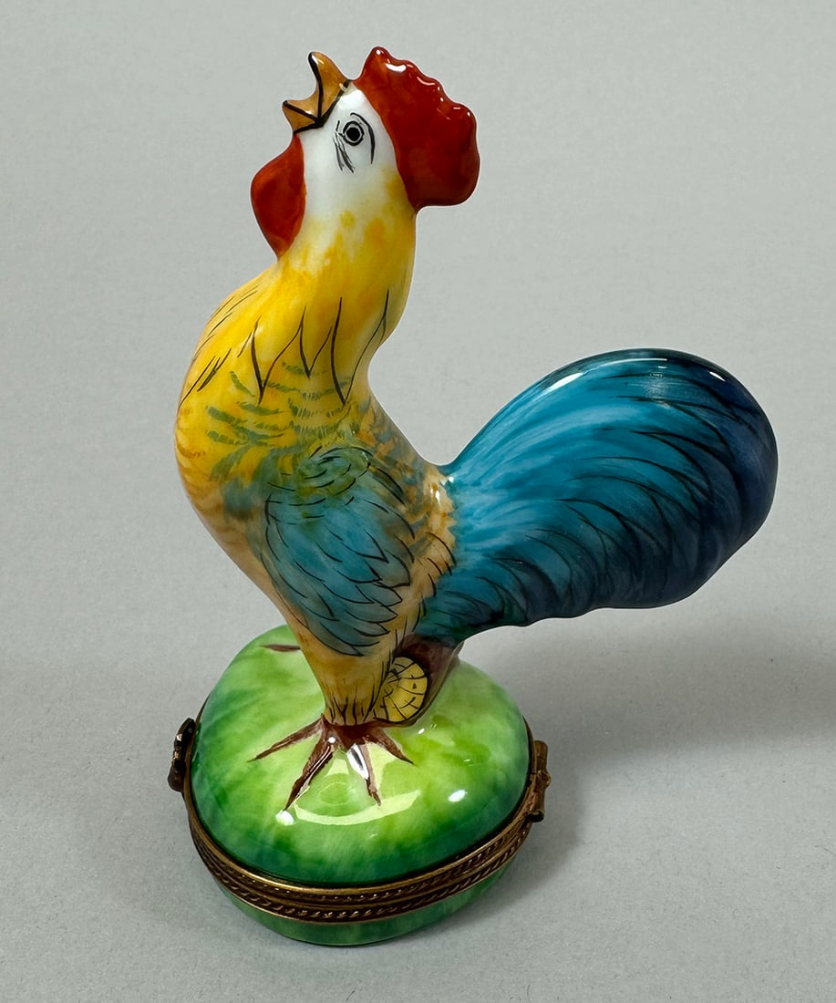 Rochard Limoges Porcelain Rooster in Original Box: Rochard Limoges porcelain rooster in it's original box. D: H4 x base width 1.75 in.