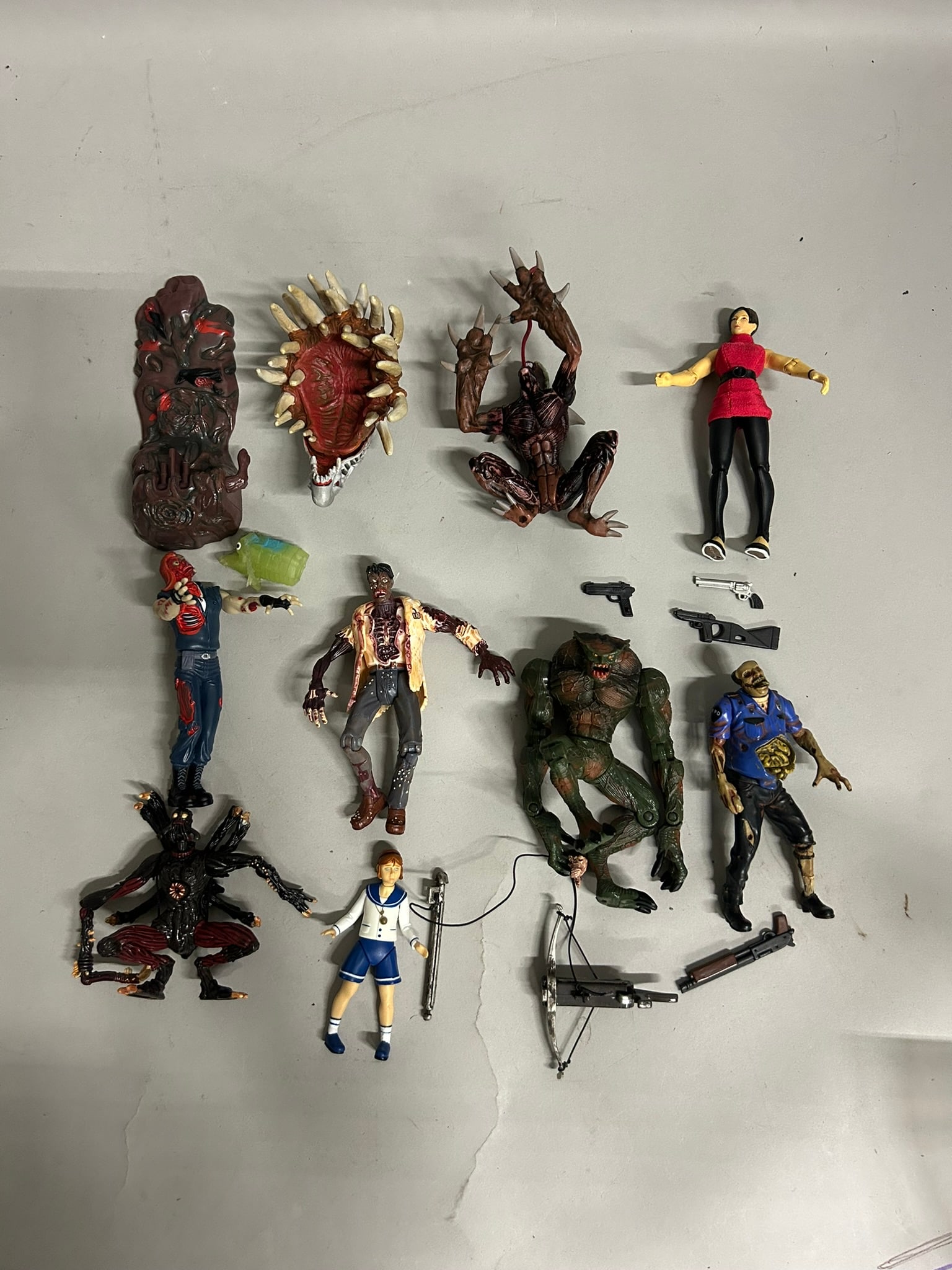 Collection of 9 Unboxed Resident Evil Action Figures (1 of 12)