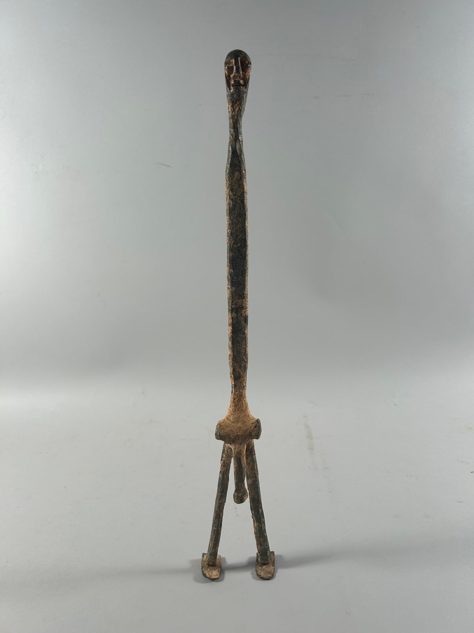 Gurunsi Wrought Iron Figure: Tall Gurunsi peoples wrought iron male figure, Burkina Faso, West Africa. Dimensions (approx.): 17.5" PROVENANCE:From the estate of Professor Philip Gould, New York