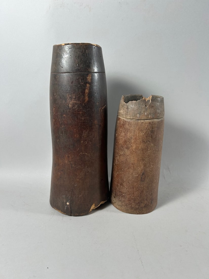 Tutsi Food Vessels (2): Two (2) Tutsi food vessels, for milk, honey, or food, Rwanda and Barundi, Central Africa. Dimenions (approx.): 12" high x 4.5" diameter (larger) and 9" high x 4.25" diameter (smaller) PROVENANCE:From