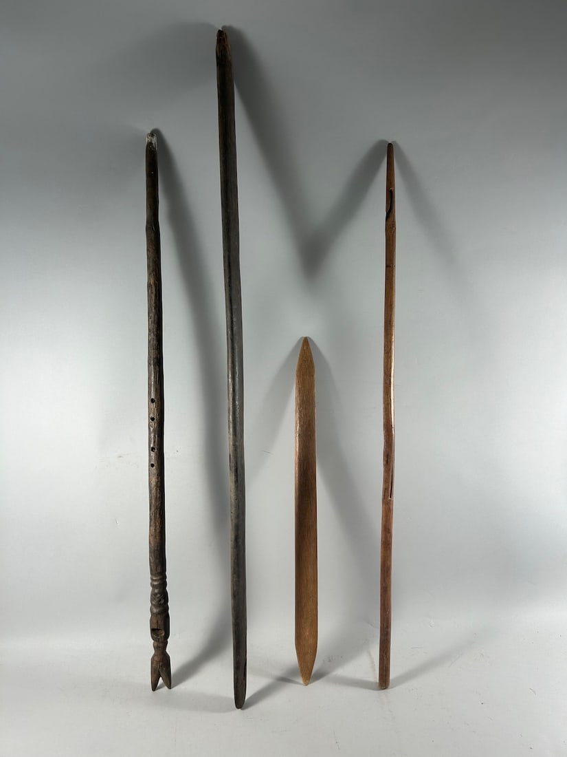 Mossi and Nupe Weaving Sticks (4): Four (4) carved wood weaving sticks, including one from the Mossi peoples of Burkina Faso, and one from the Nupé peoples of Nigeria, West Africa. Dimensions (approx.) : 48" (largest) to 27.5" (smalle