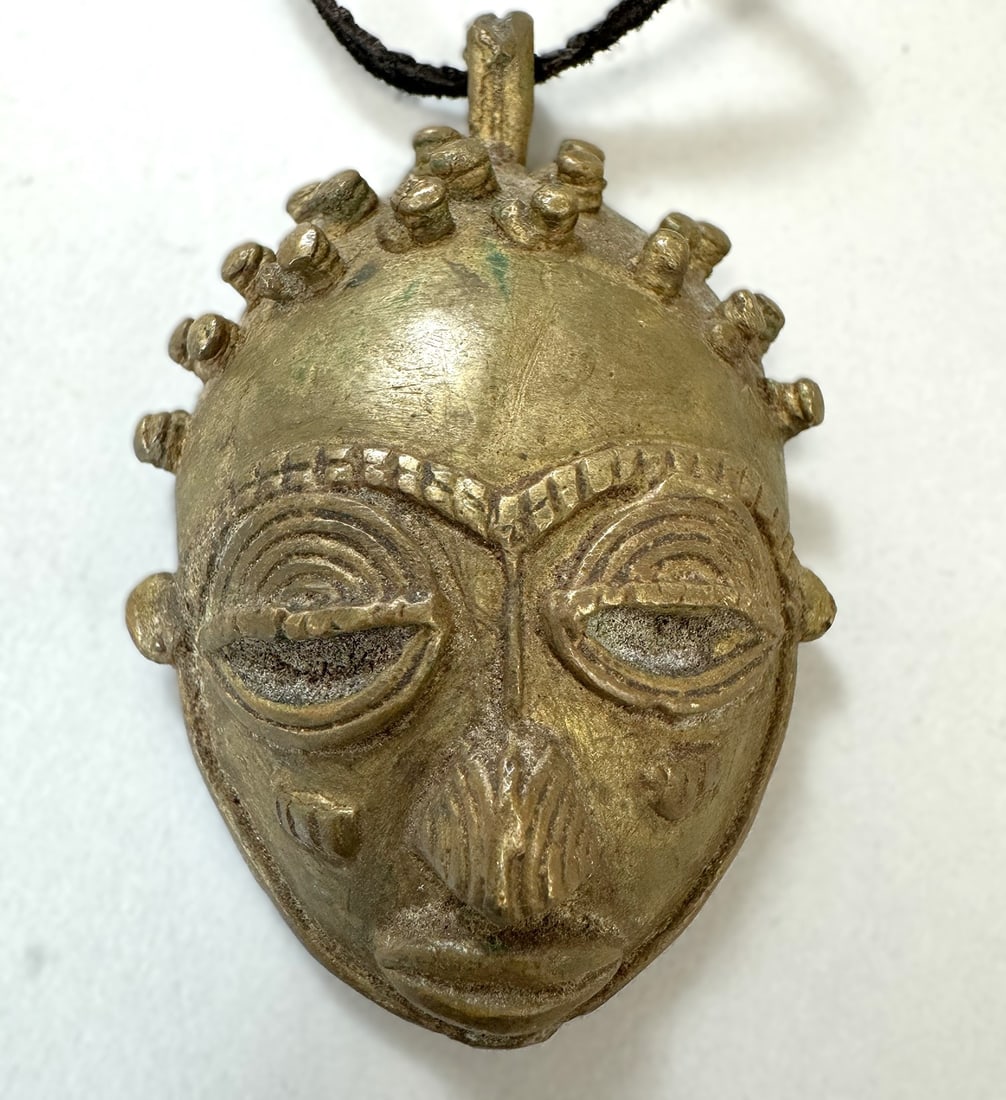 Ashanti Copper Alloy Pendant: Copper alloy pendant, Ashanti peoples, Ghana or Ivory Coast, West Africa, Dimensions (approx.): 2.75" x 1.5"br> PROVENANCE:From the estate of Professor Philip Gould, New York