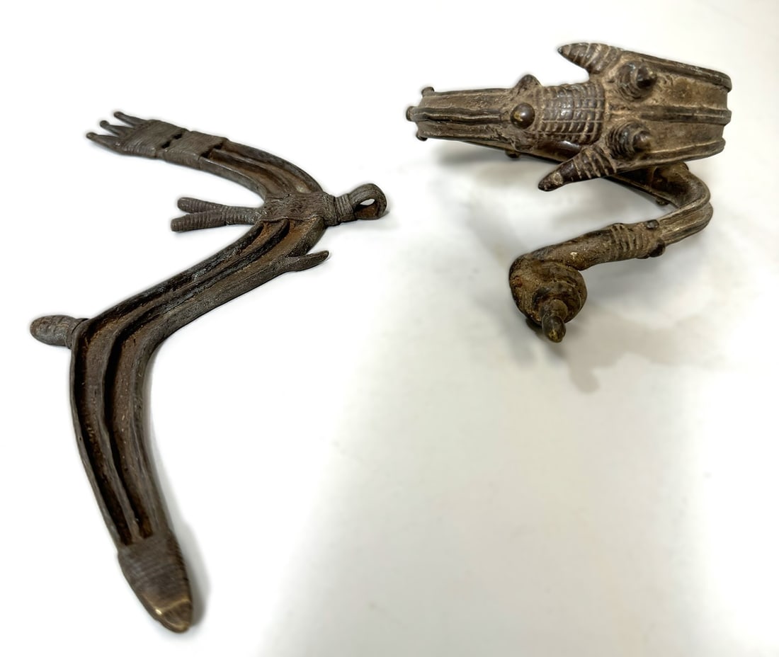 Bracelet and Pendant, Burkina Faso (2): Two (2) adornments, including a copper alloy pendant and bracelet, Burkina Faso, West Africa. Dimensions (approx.): 4.25" diameter (bracelet) and 9.5" x 4.5" (pendant)br> PROVENANCE:From the estate of