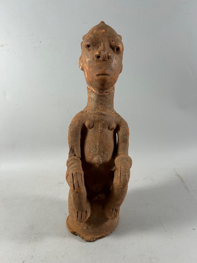 Katsina Style Terracotta: A Katsina style terracotta urn (note: head is loose), Nigeria, West Africa. Dimensions (approx.): 16.5" x 5.5" x 5" PROVENANCE:From the estate of Professor Philip Gould, New York