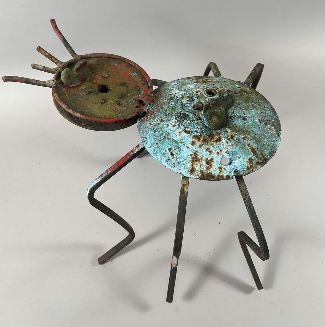 Welded Folk Garden Art Sculpture: Welded Metal Spider Sculpture. Sculpture is made of various recycled metal objects by a folk artist from Southern Jersey. Measures Approx. 13"l x 13.5"w x 9.5"h