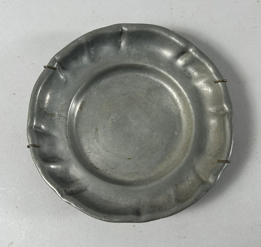 Mid Century Pewter Plate: Mid Century Pewter Danish Crown Craved Plate. 1.5"h x 6"w (diameter)