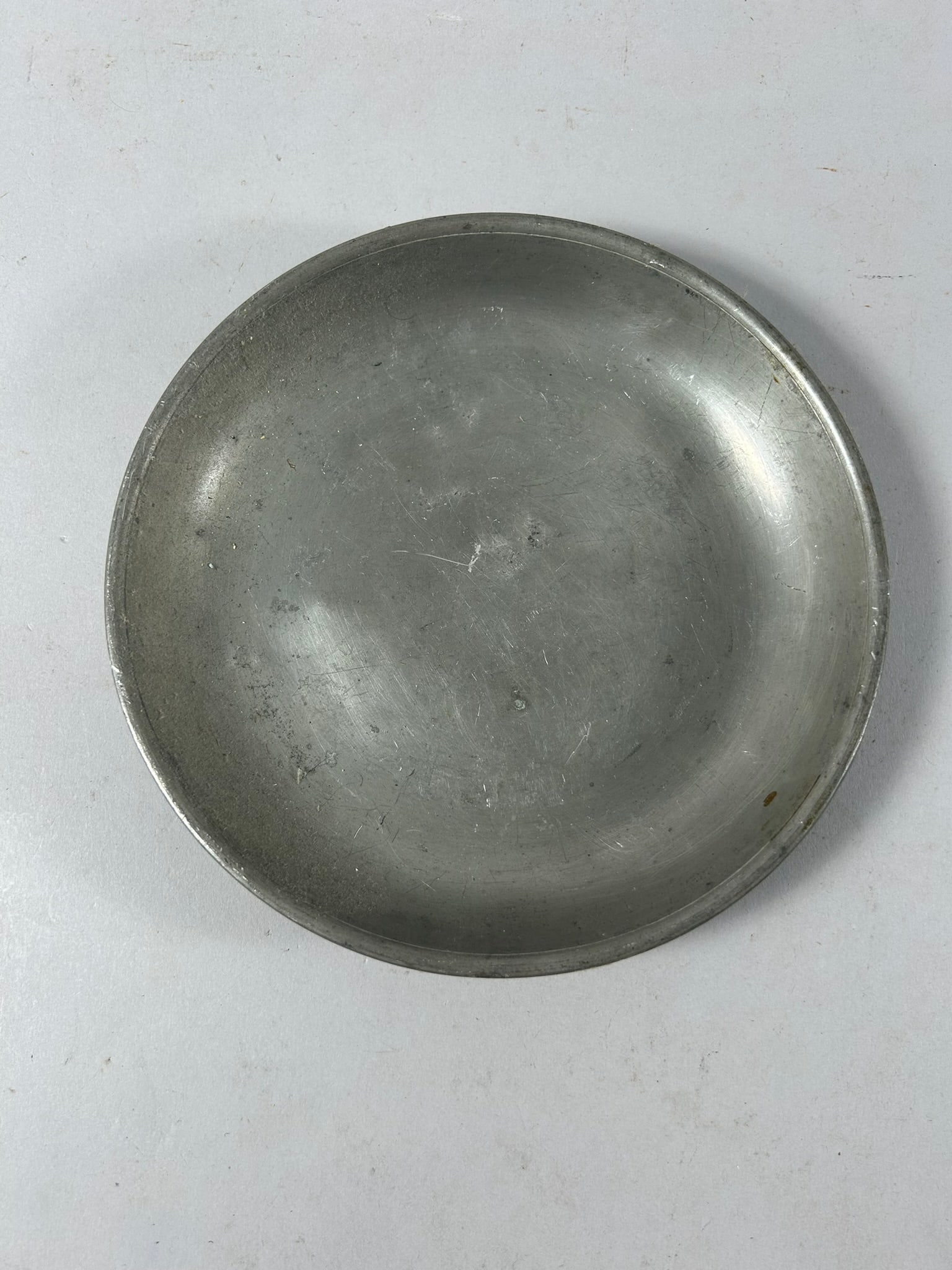 European Pewter Plate: Pewter Dessert/Charger Plate. European Hallmark Engraved on Back. 1.5"h x 8"w (diameter)